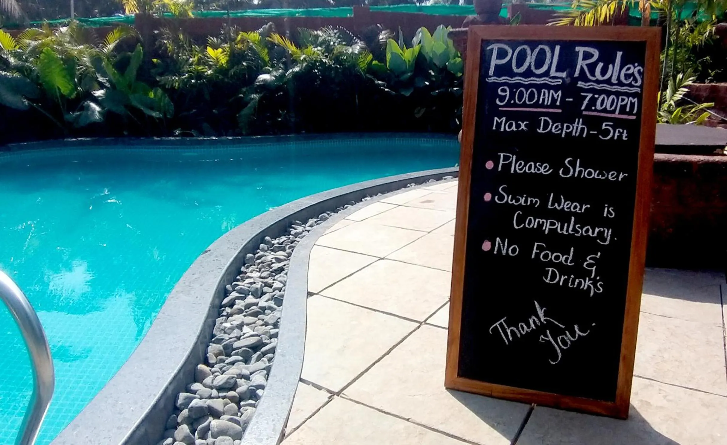 Swimming pool in Little India Beach Cottages