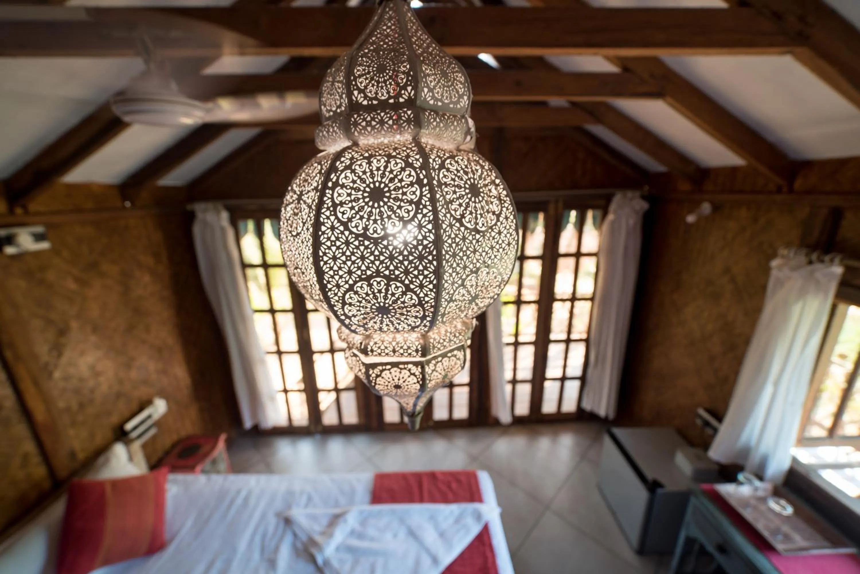 Decorative detail, Bed in Little India Beach Cottages
