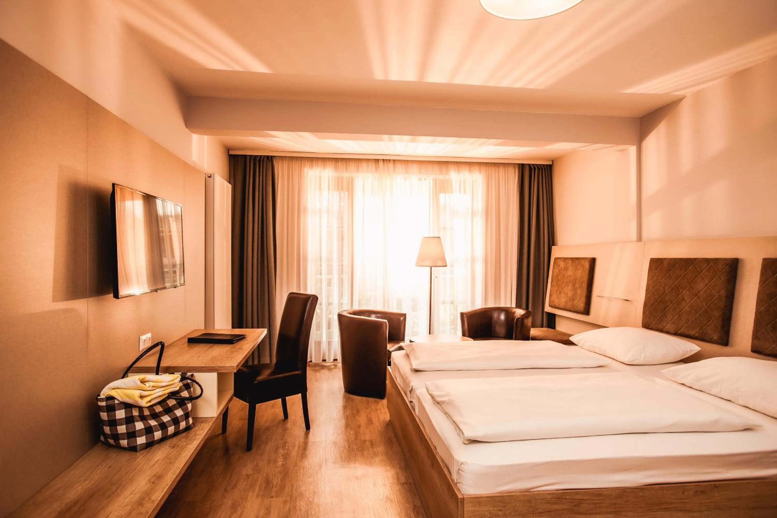 Photo of the whole room, Bed in Simon - das Vitalhotel