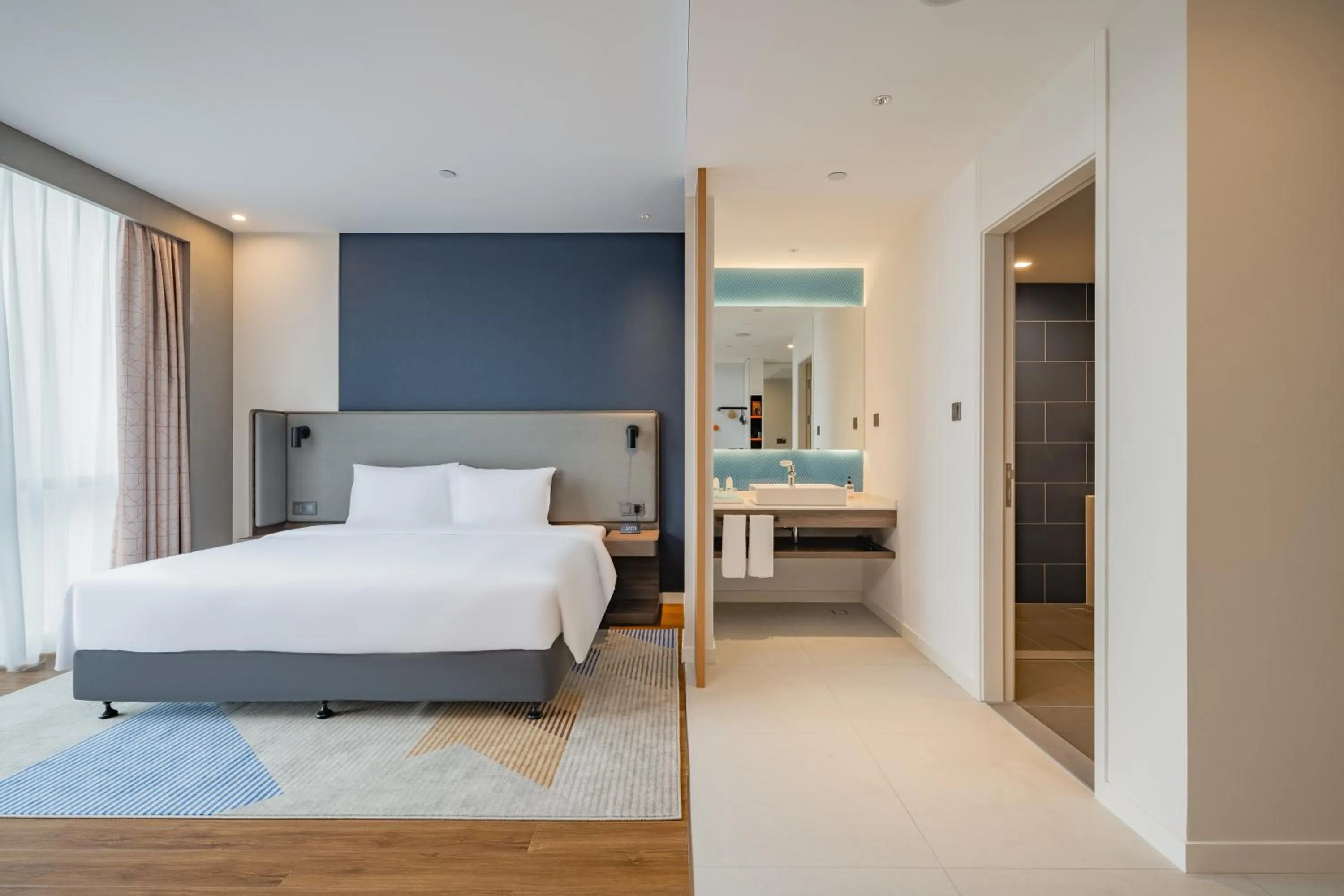 Bed in Holiday Inn Express Nanning Jiangnan by IHG