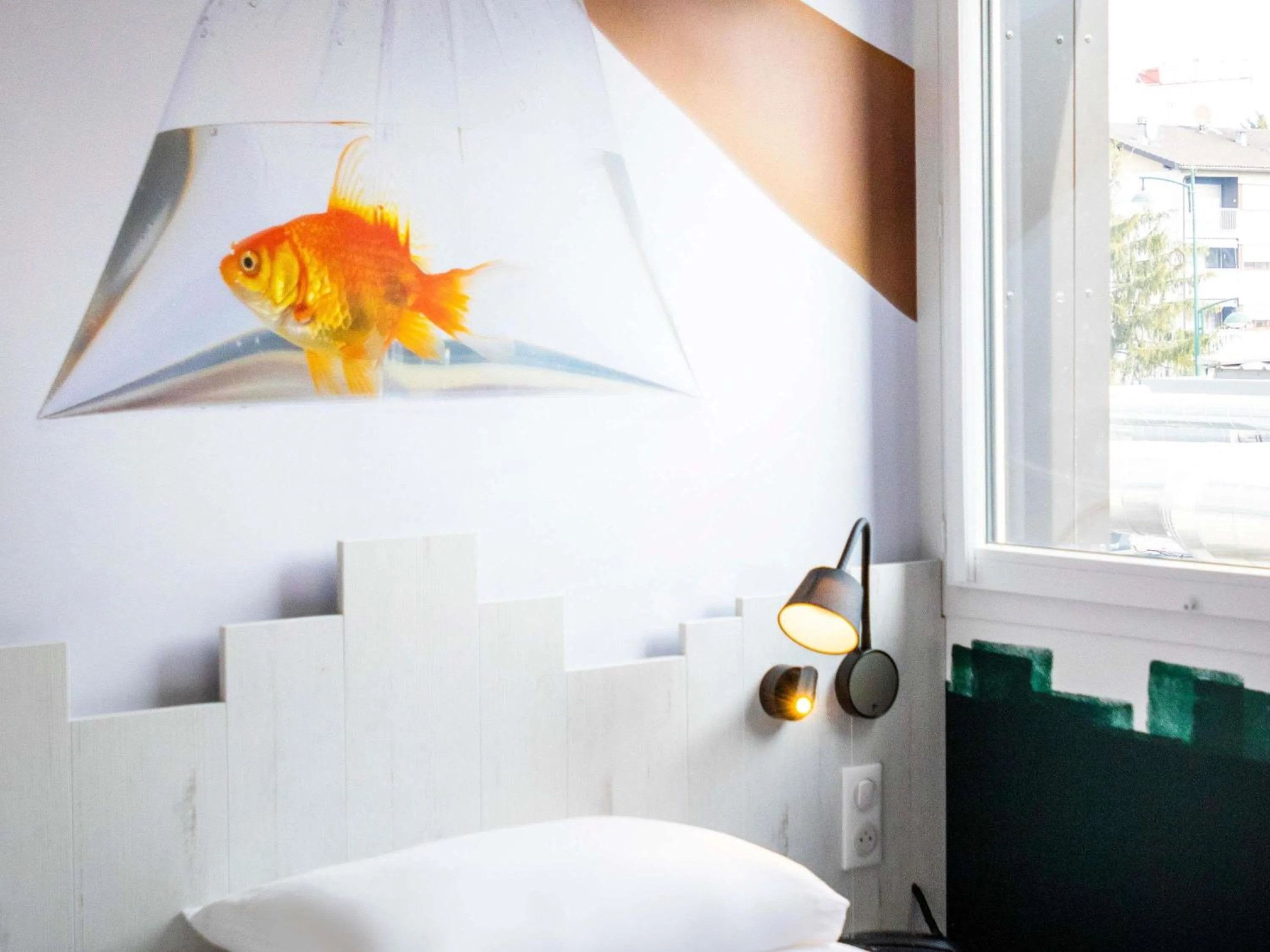 Bedroom in ibis Styles Thonon-les-Bains