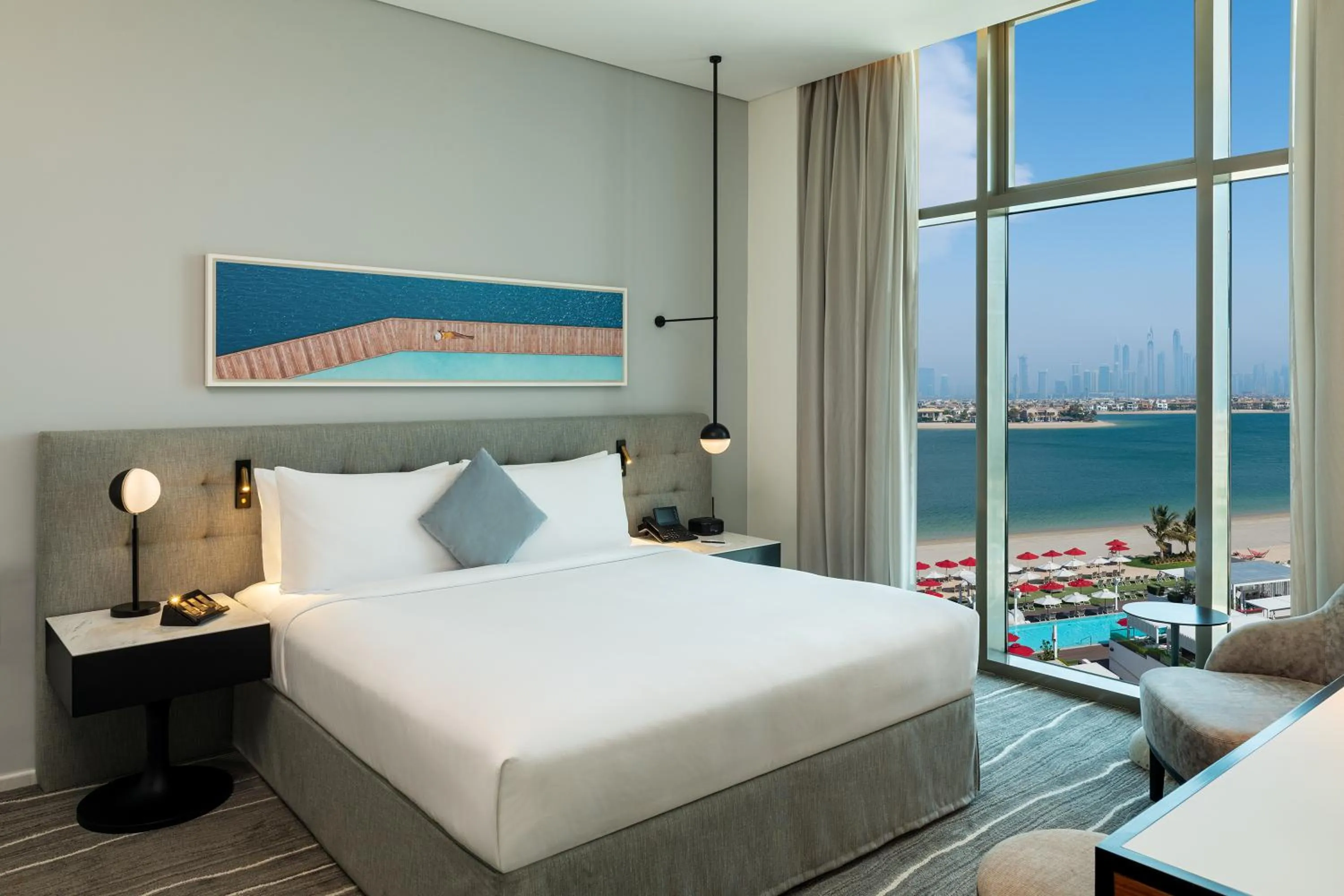 Bed in Th8 Palm Dubai Beach Resort Vignette Collection, an IHG hotel