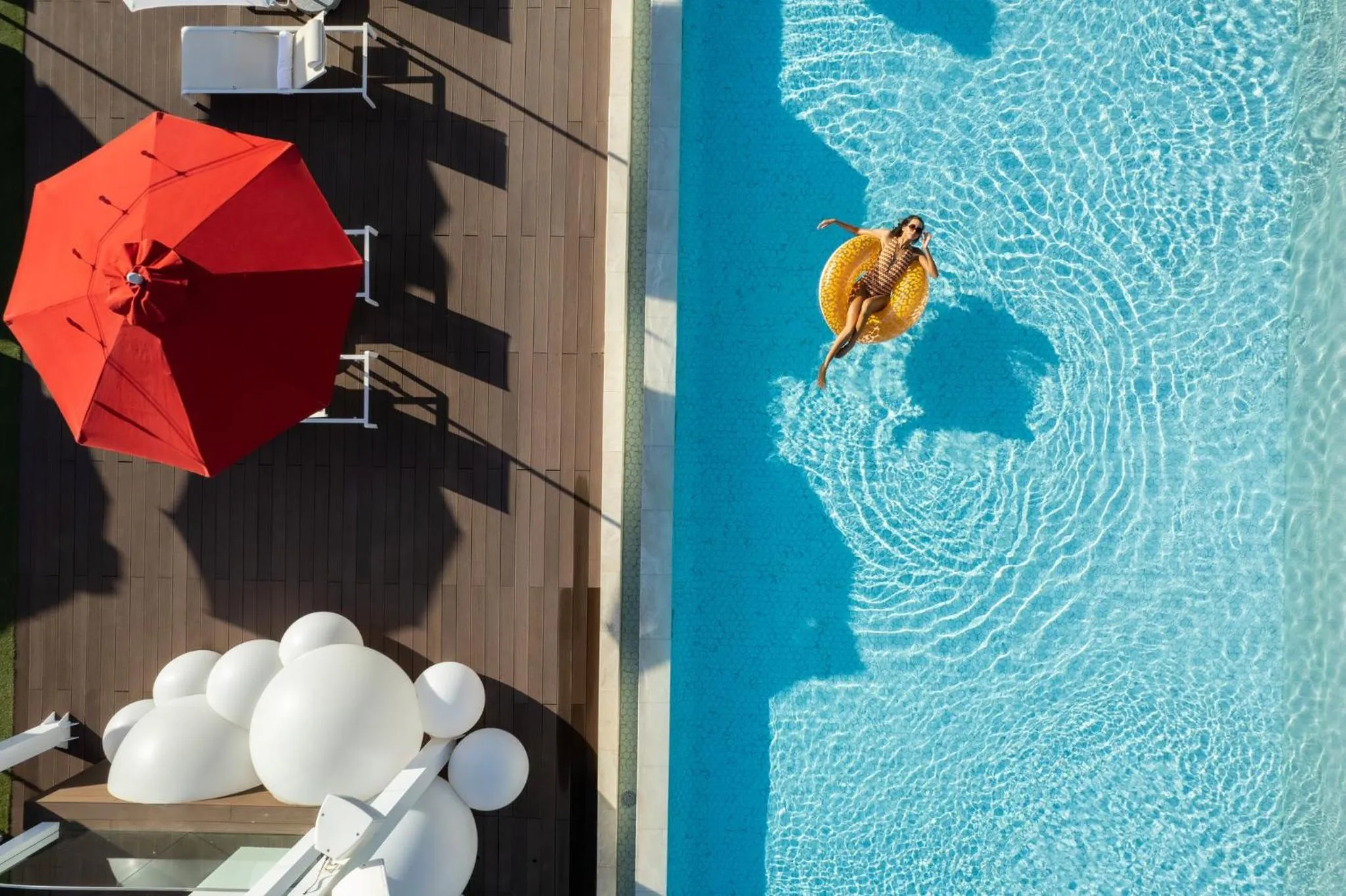 Property building in Th8 Palm Dubai Beach Resort, Vignette Collection by IHG