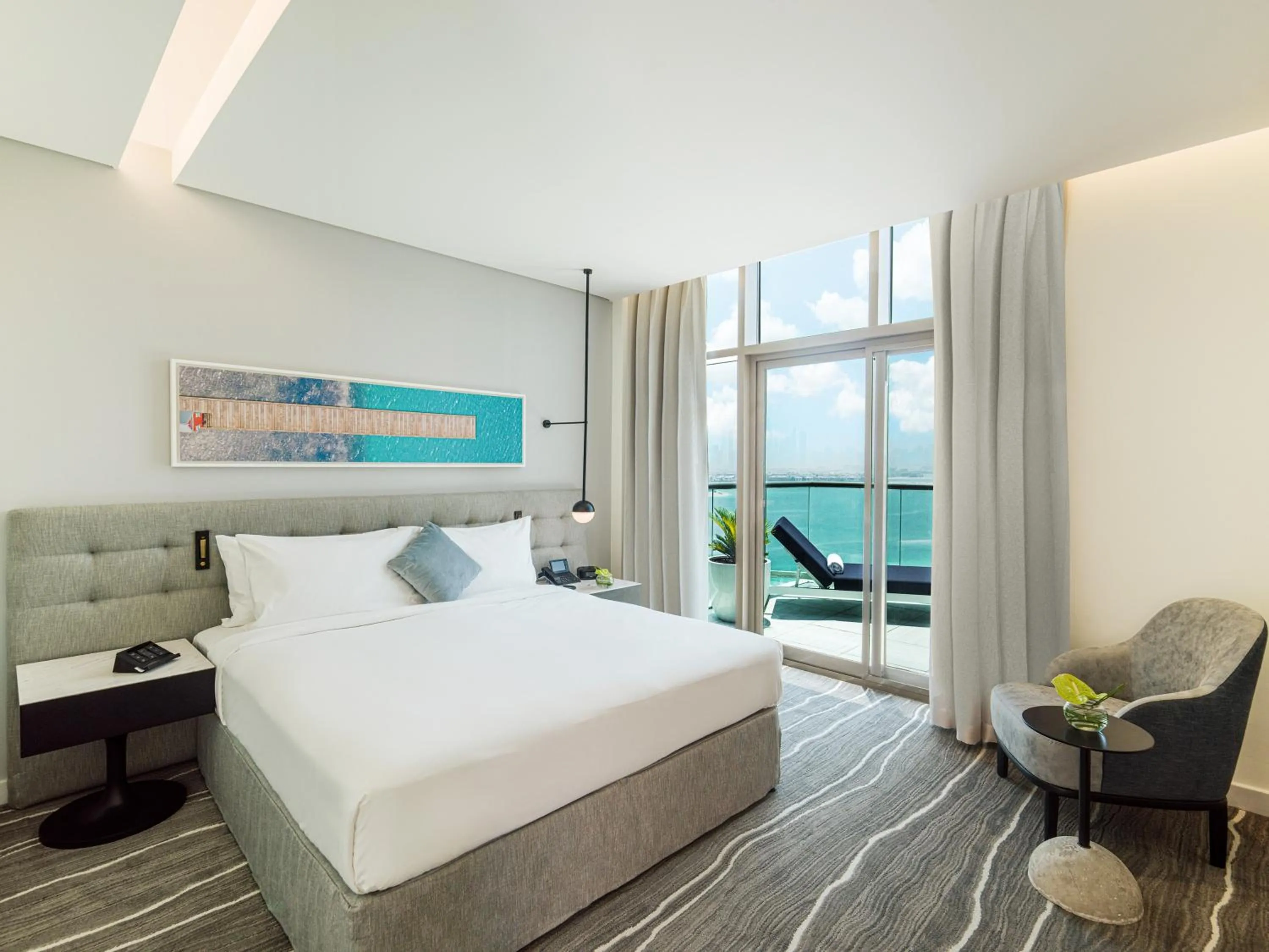 Photo of the whole room, Bed in Th8 Palm Dubai Beach Resort Vignette Collection, an IHG hotel