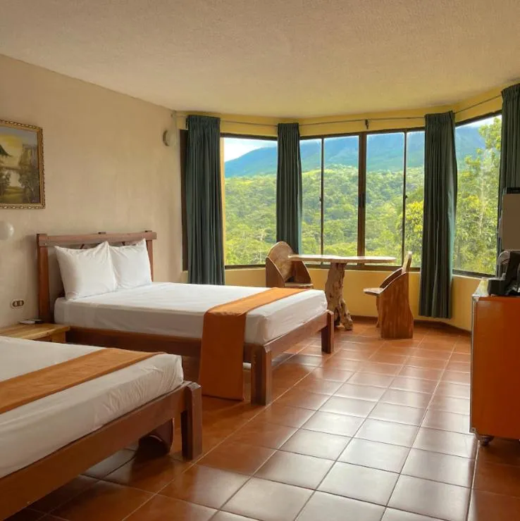 Bed in Arenal Roca Lodge & Bungalows
