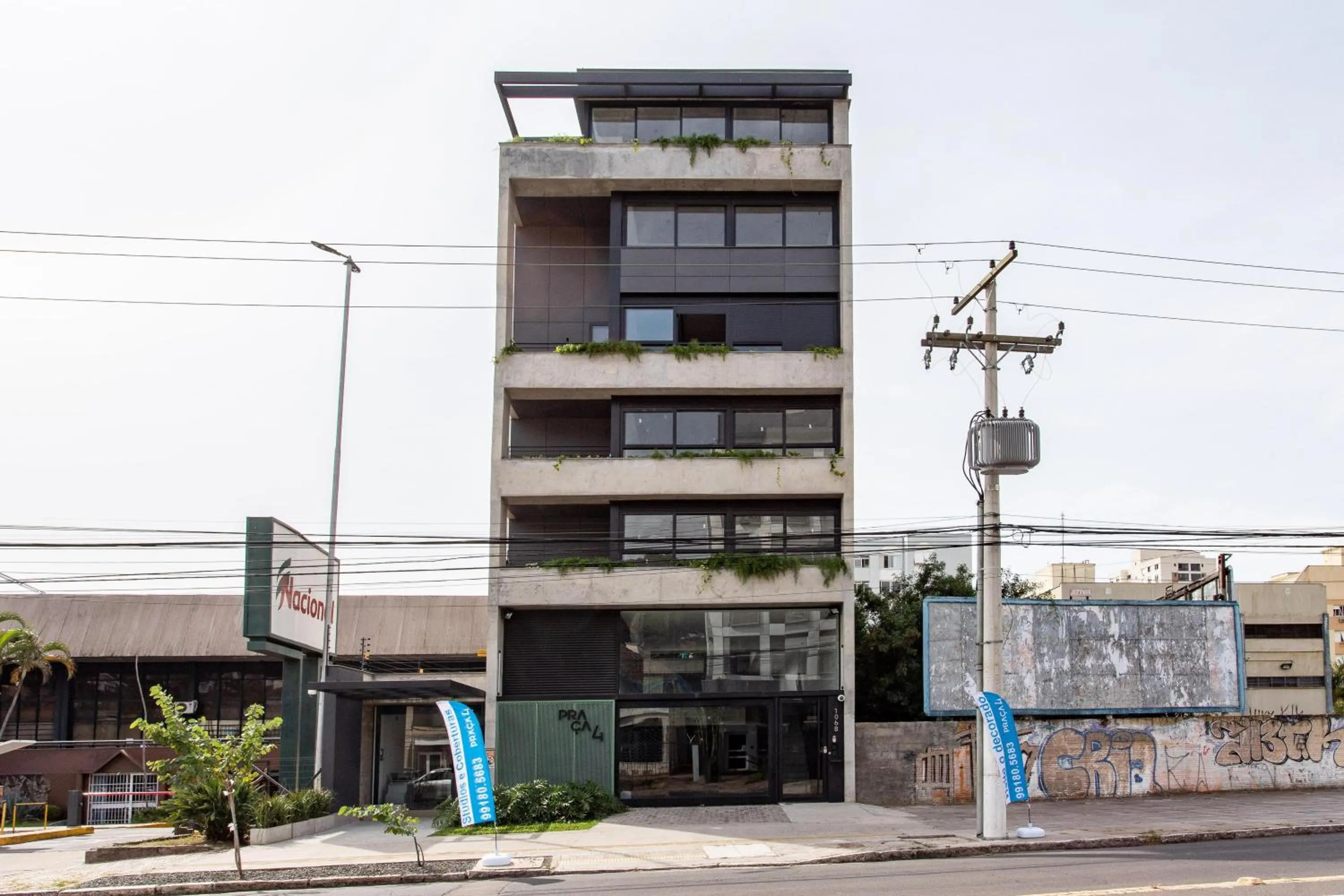 Property building in Charlie em POA - Studio Moderno com Coworking e Lavanderia