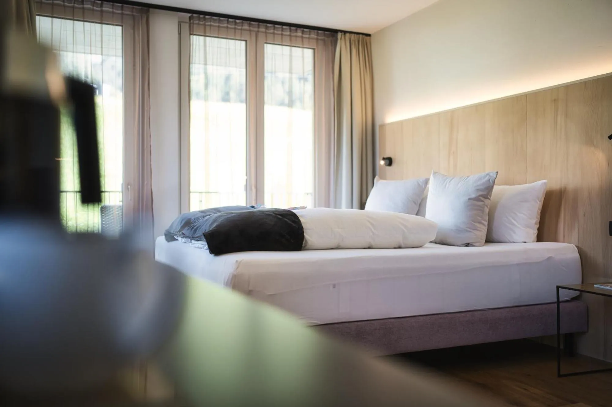 Bed in Hotel Die Arlbergerin - Design & Tiroler Gemütlichkeit