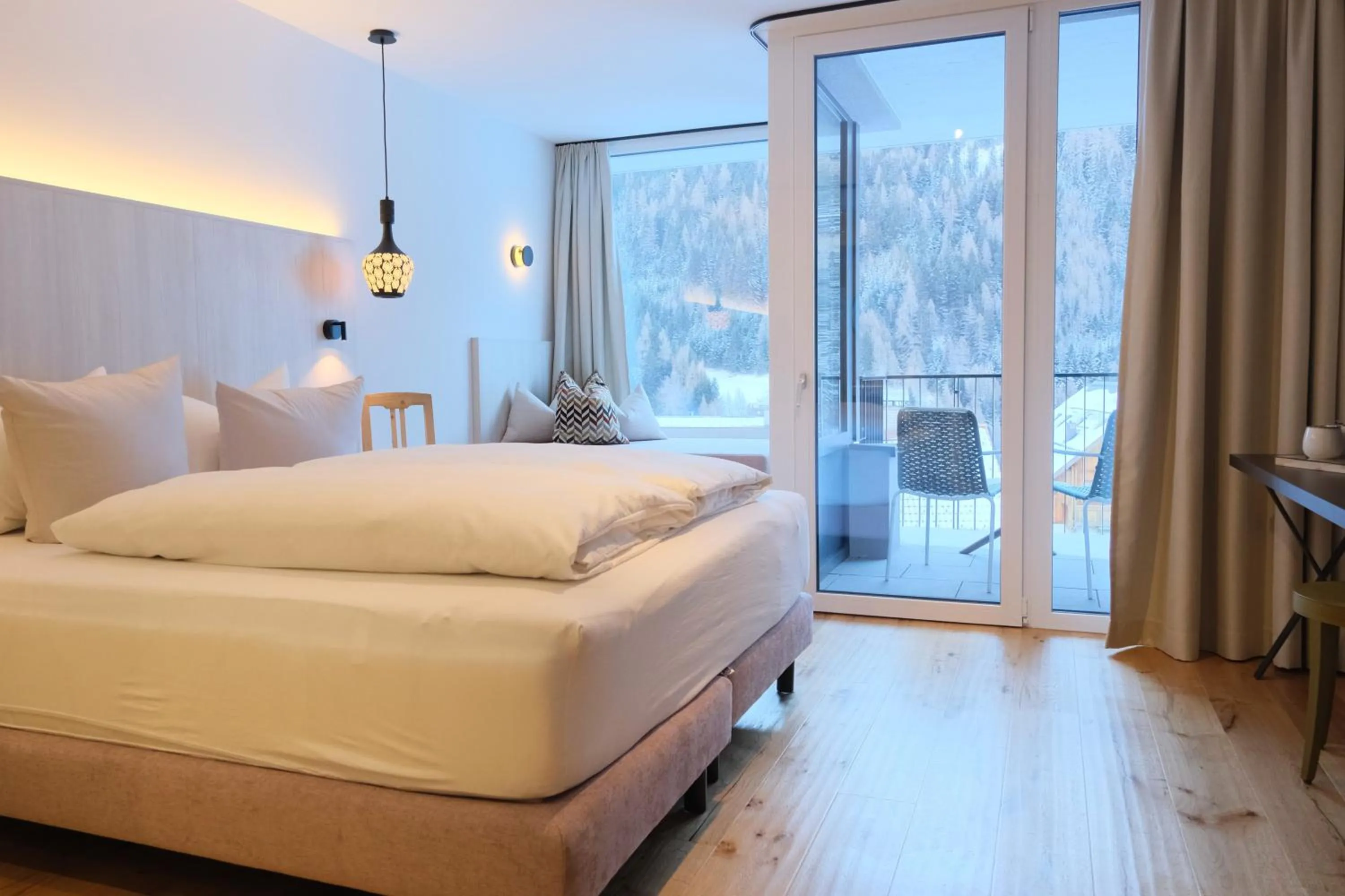 Photo of the whole room, Bed in Hotel Die Arlbergerin - Design & Tiroler Gemütlichkeit