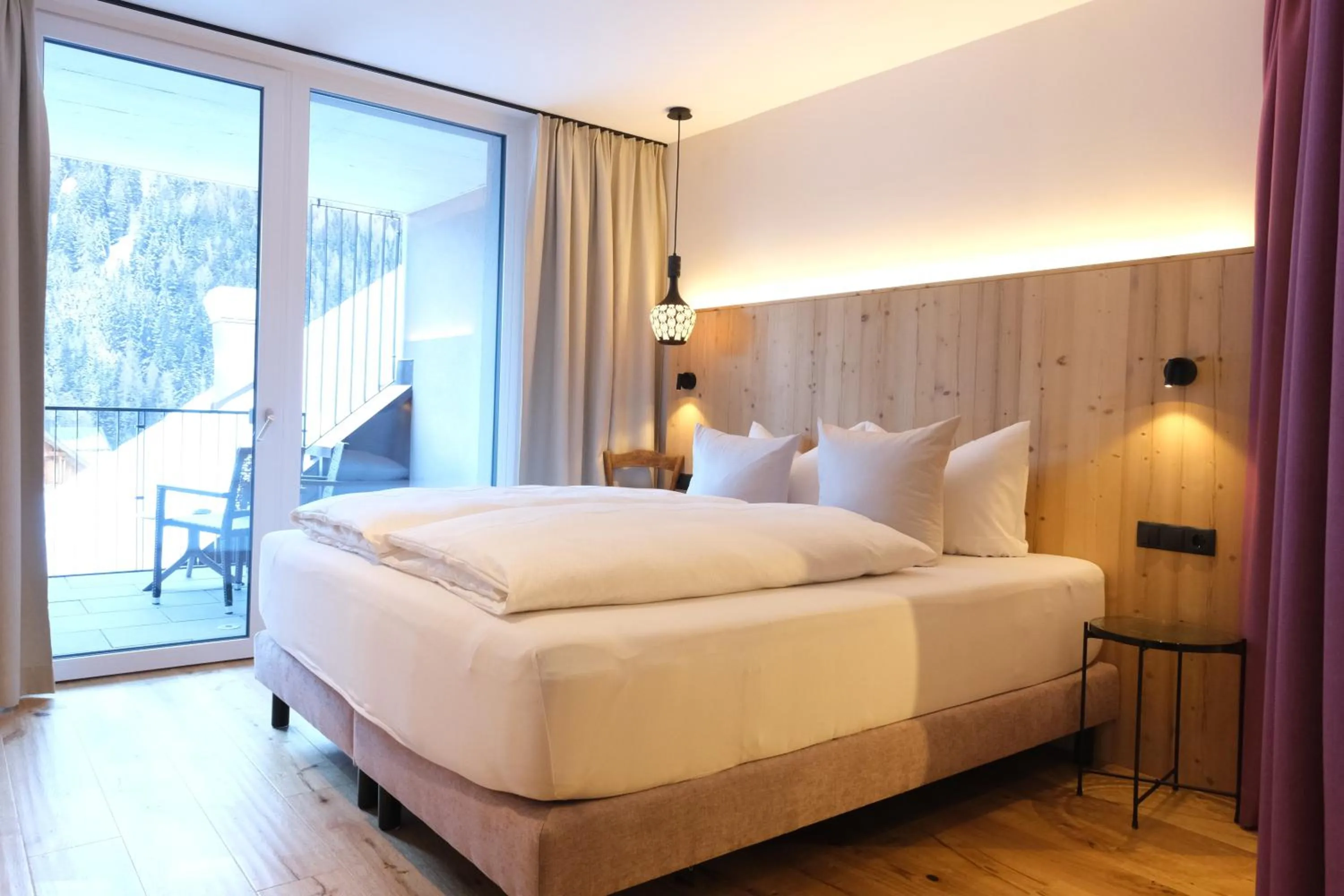 Photo of the whole room, Bed in Hotel Die Arlbergerin - Design & Tiroler Gemütlichkeit