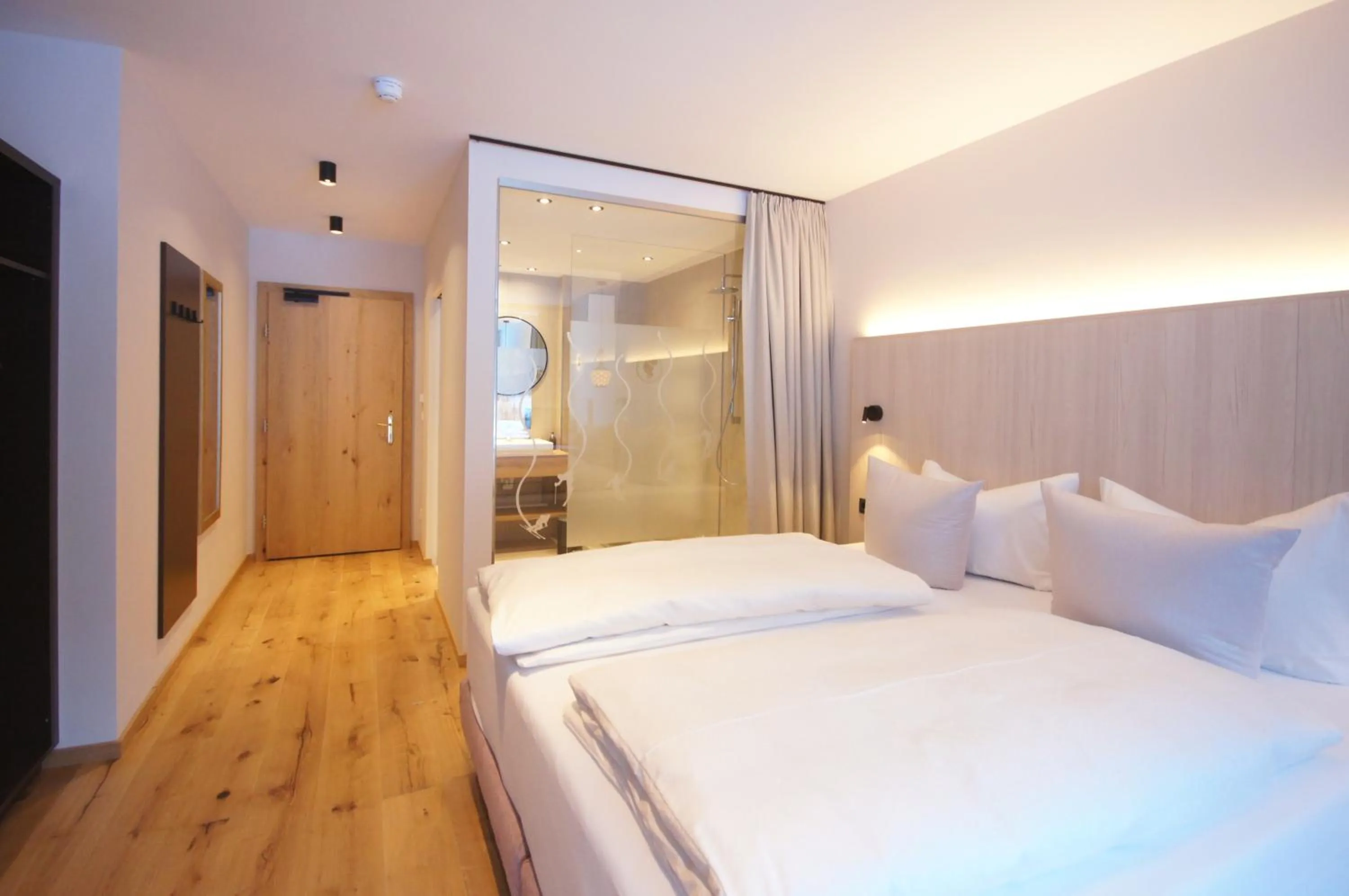 Photo of the whole room, Bed in Hotel Die Arlbergerin - Design & Tiroler Gemütlichkeit