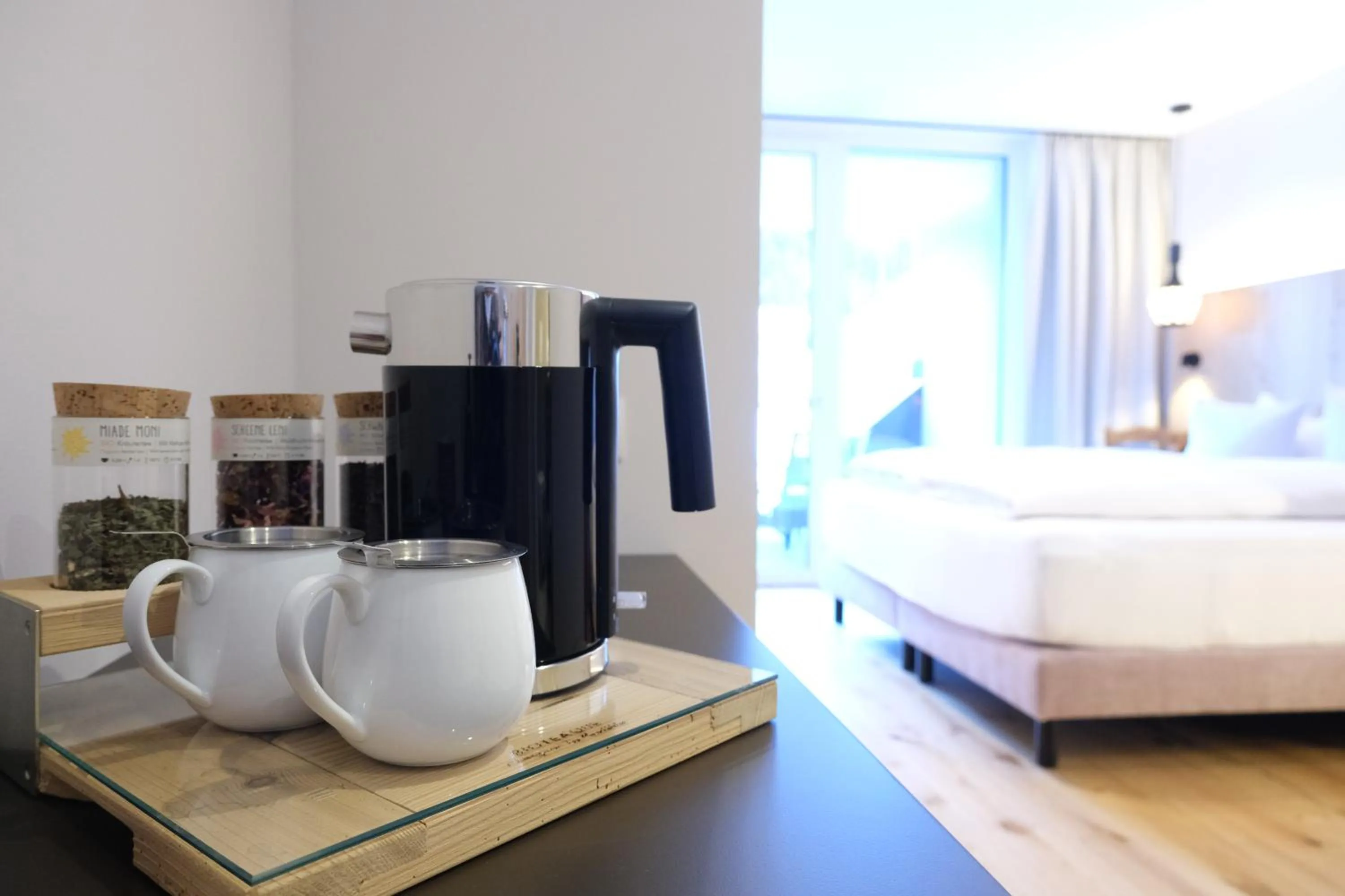 Coffee/tea facilities, Bed in Hotel Die Arlbergerin - Design & Tiroler Gemütlichkeit