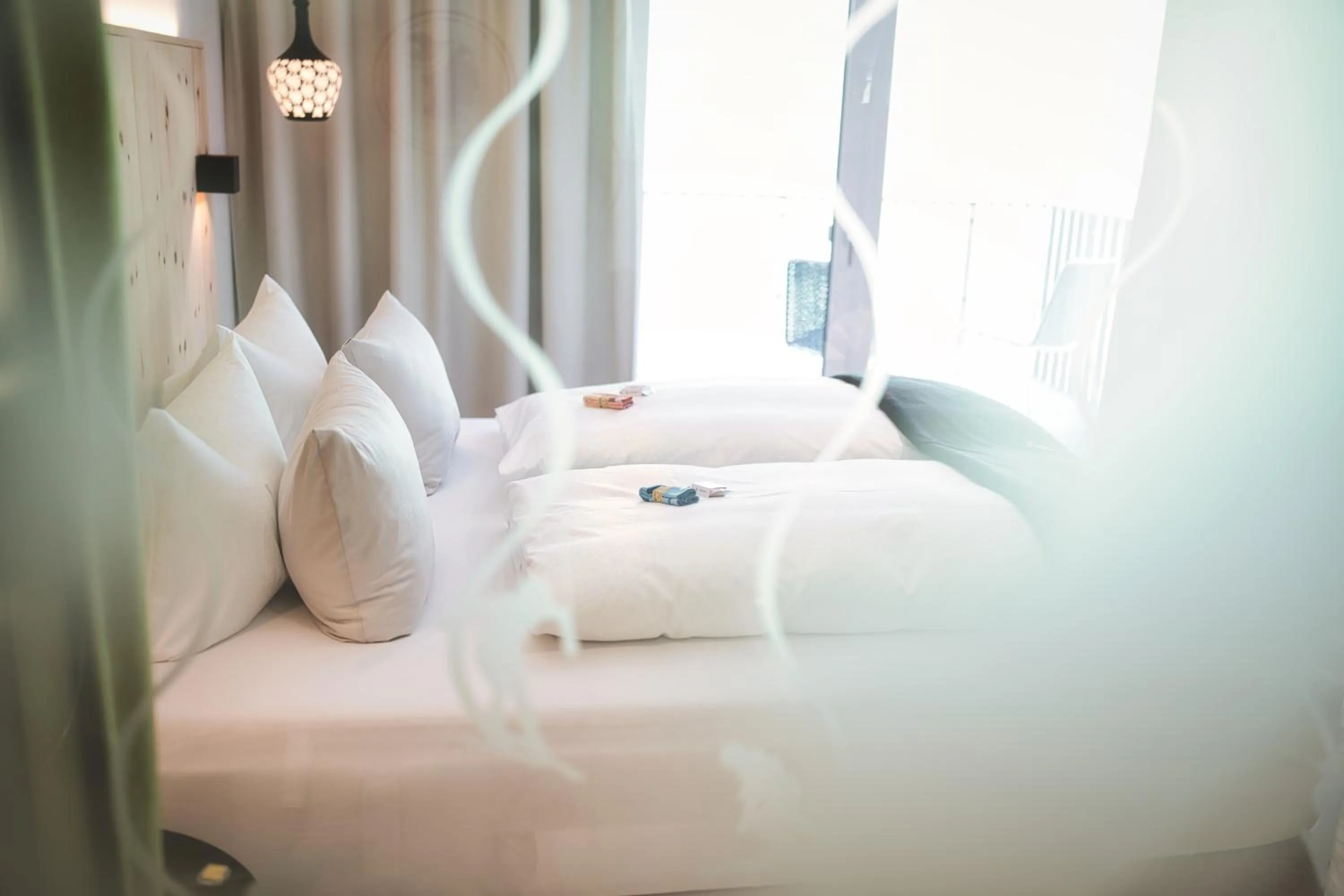 Bedroom, Bed in Hotel Die Arlbergerin - Design & Tiroler Gemütlichkeit