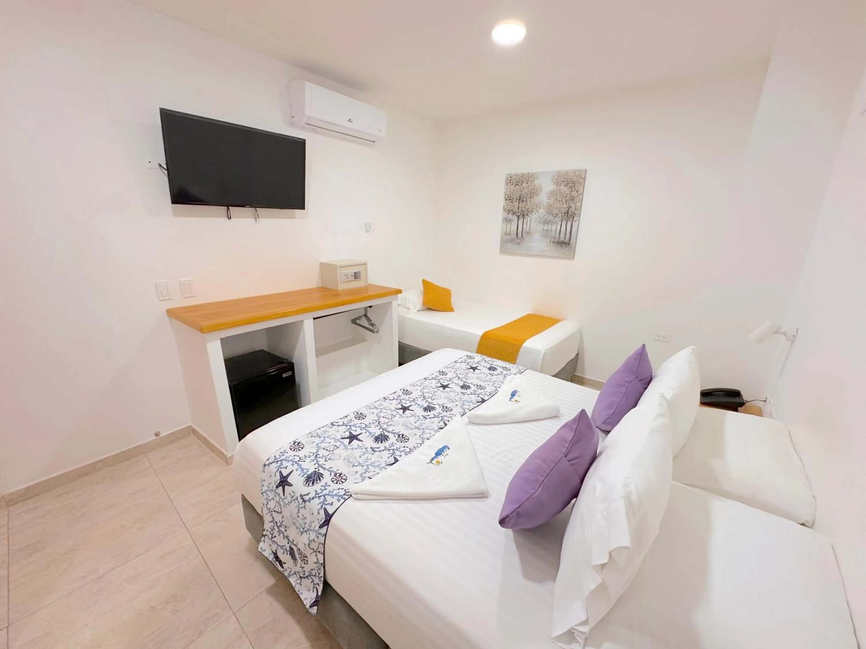 Bed in Hotel Grand Caribe