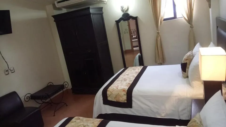 Photo of the whole room, Bed in Hotel Hacienda los Narcisos