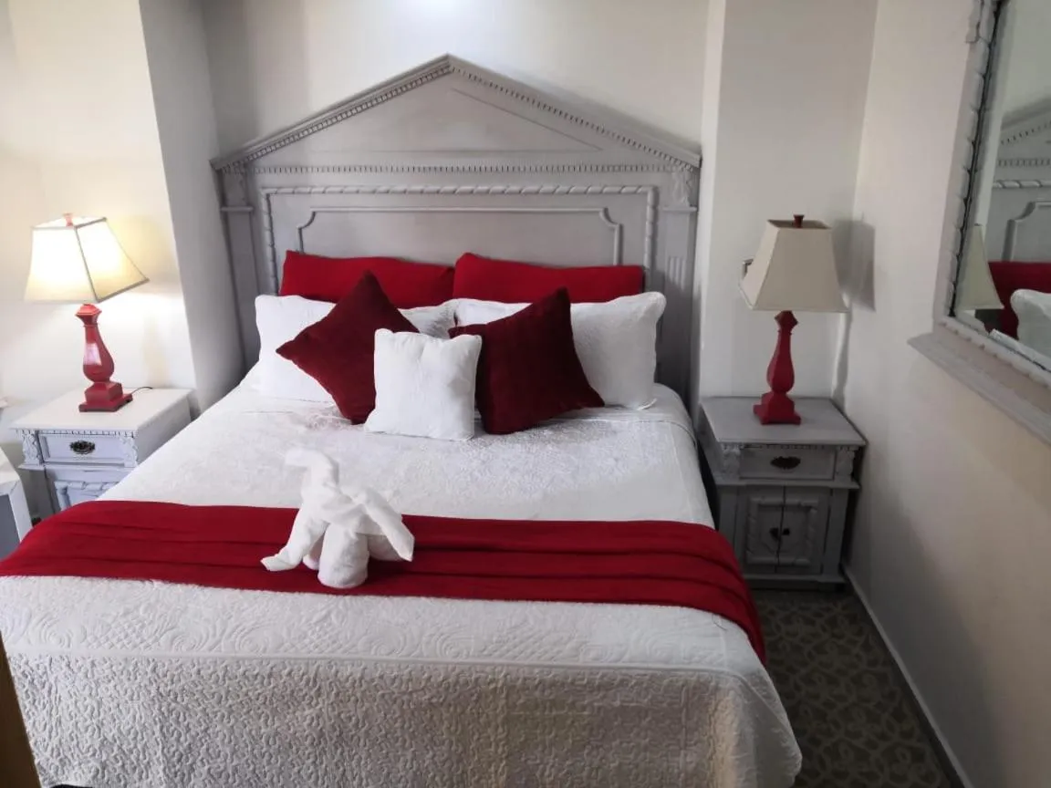 Bed in Hotel Hacienda los Narcisos