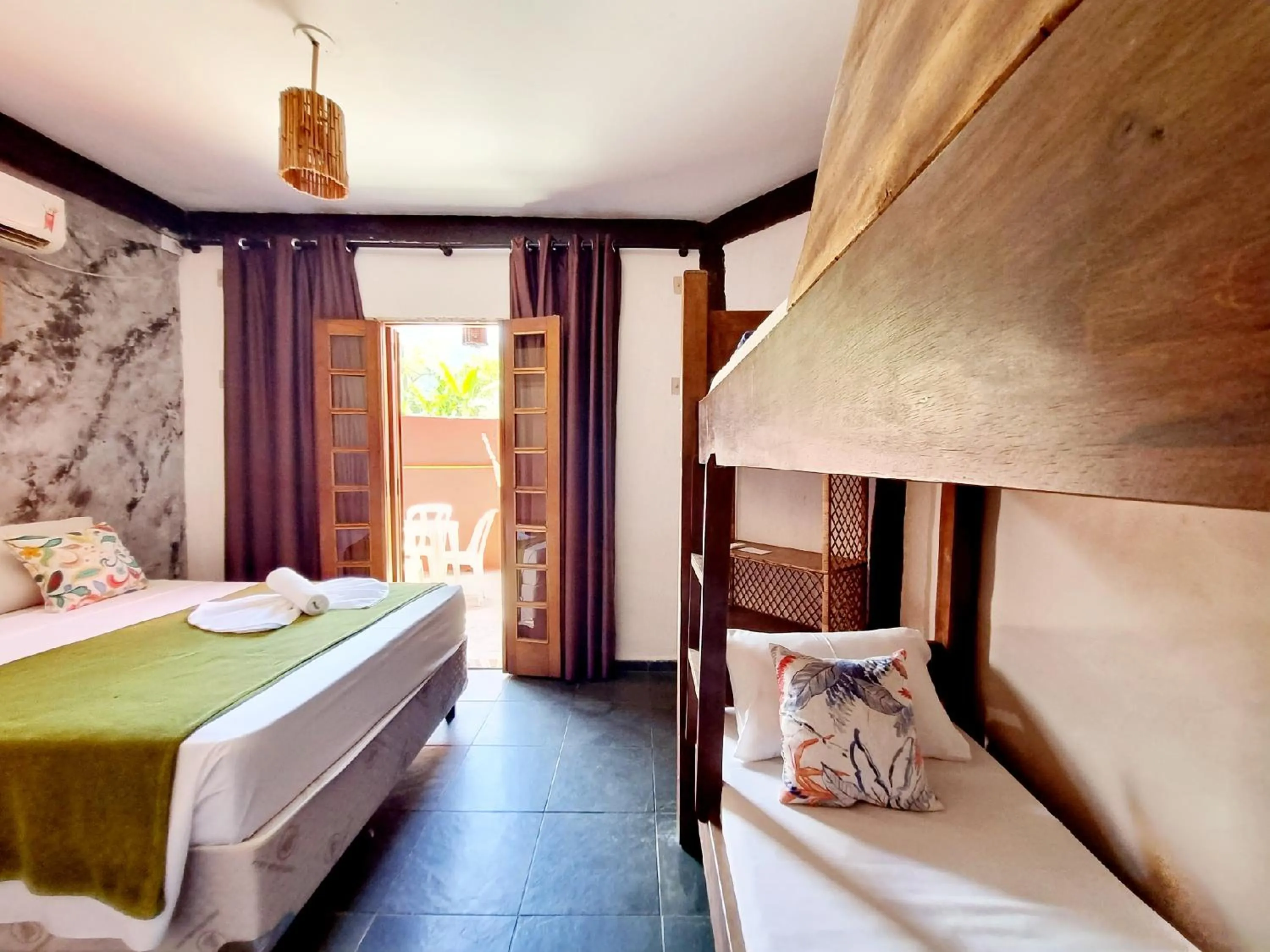 Bed in Pousada Delta Mar Maresias