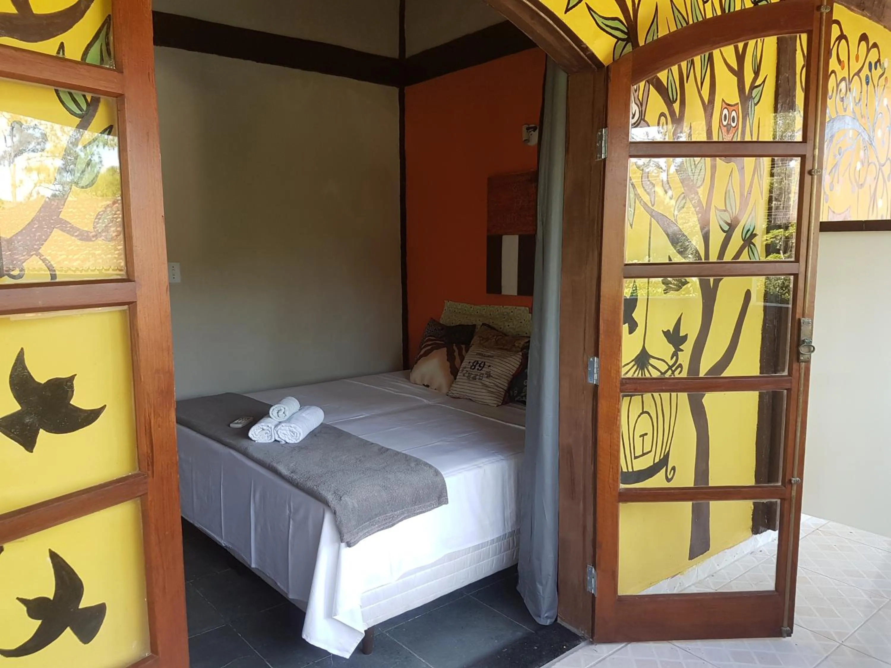 Bed in Pousada Delta Mar Maresias