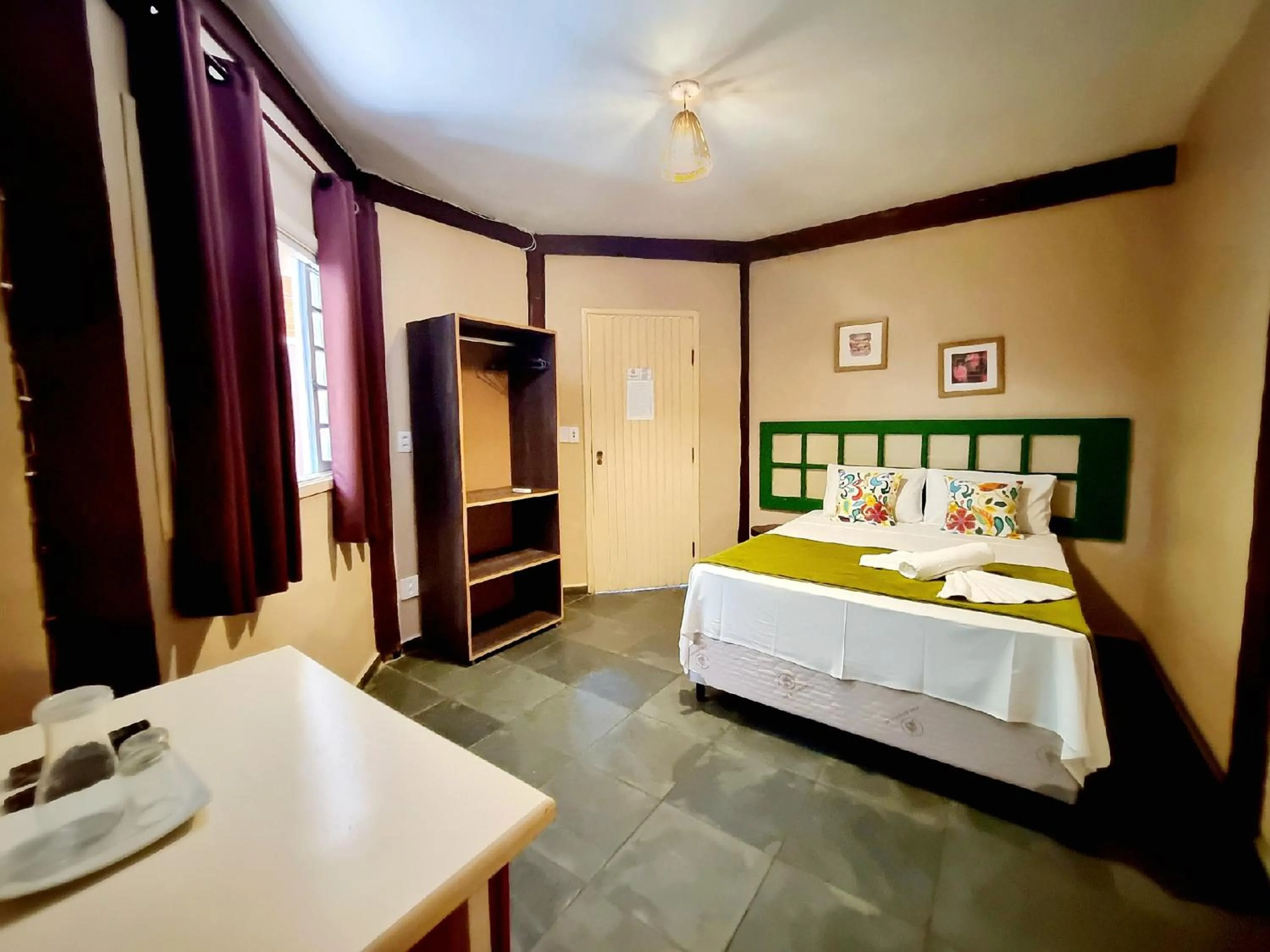 Bed in Pousada Delta Mar Maresias