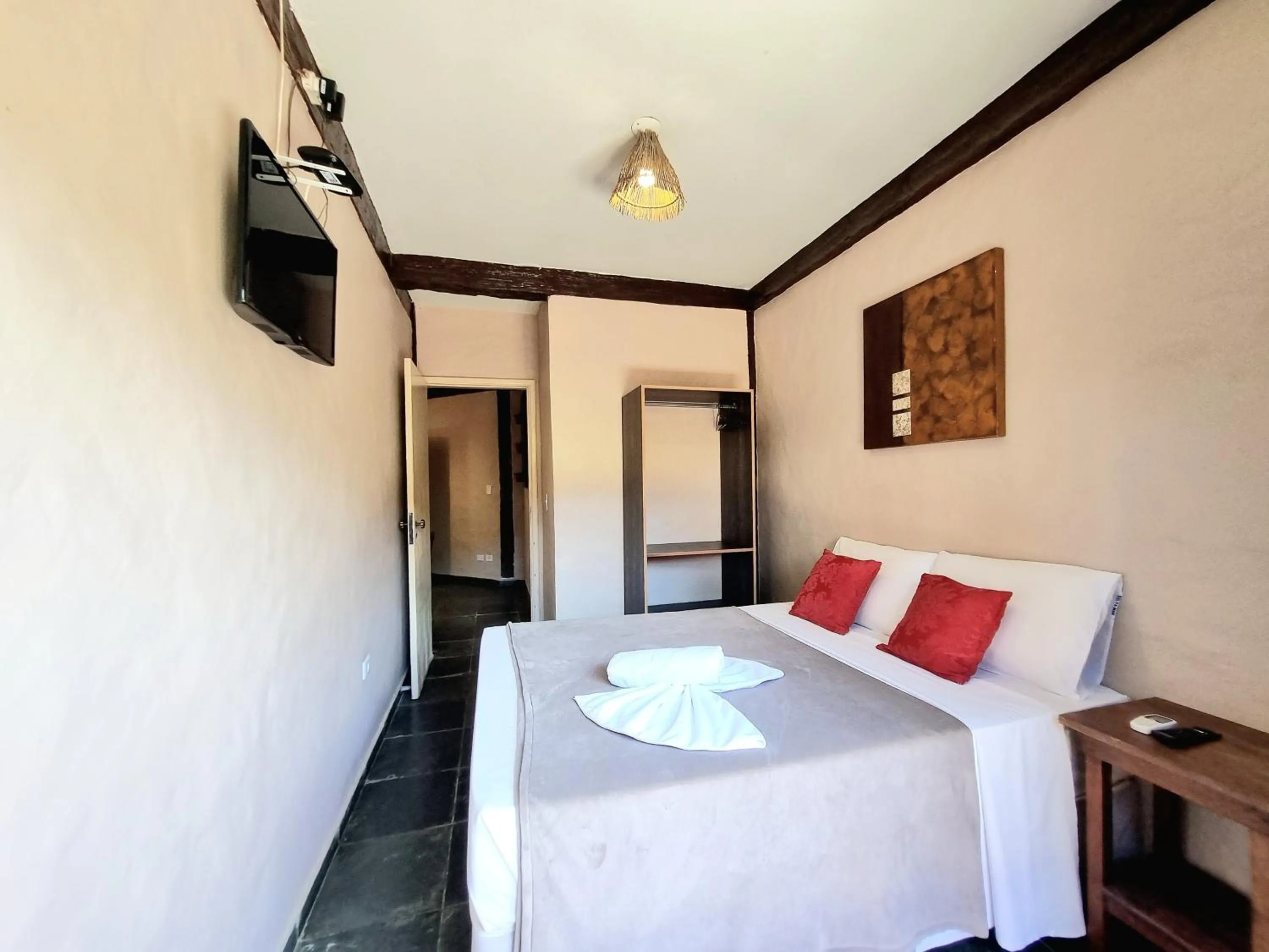 Bed in Pousada Delta Mar Maresias