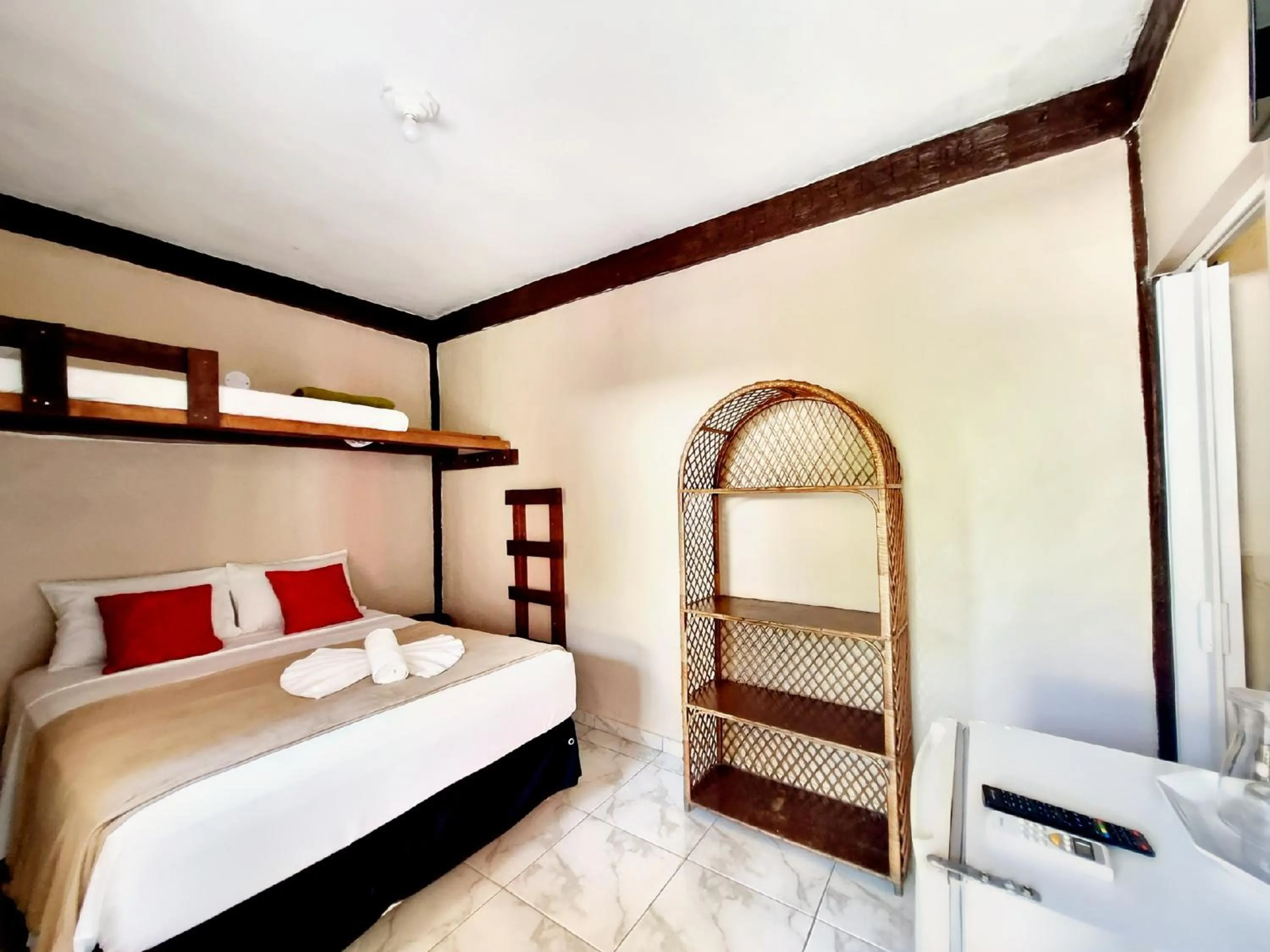 Bed in Pousada Delta Mar Maresias