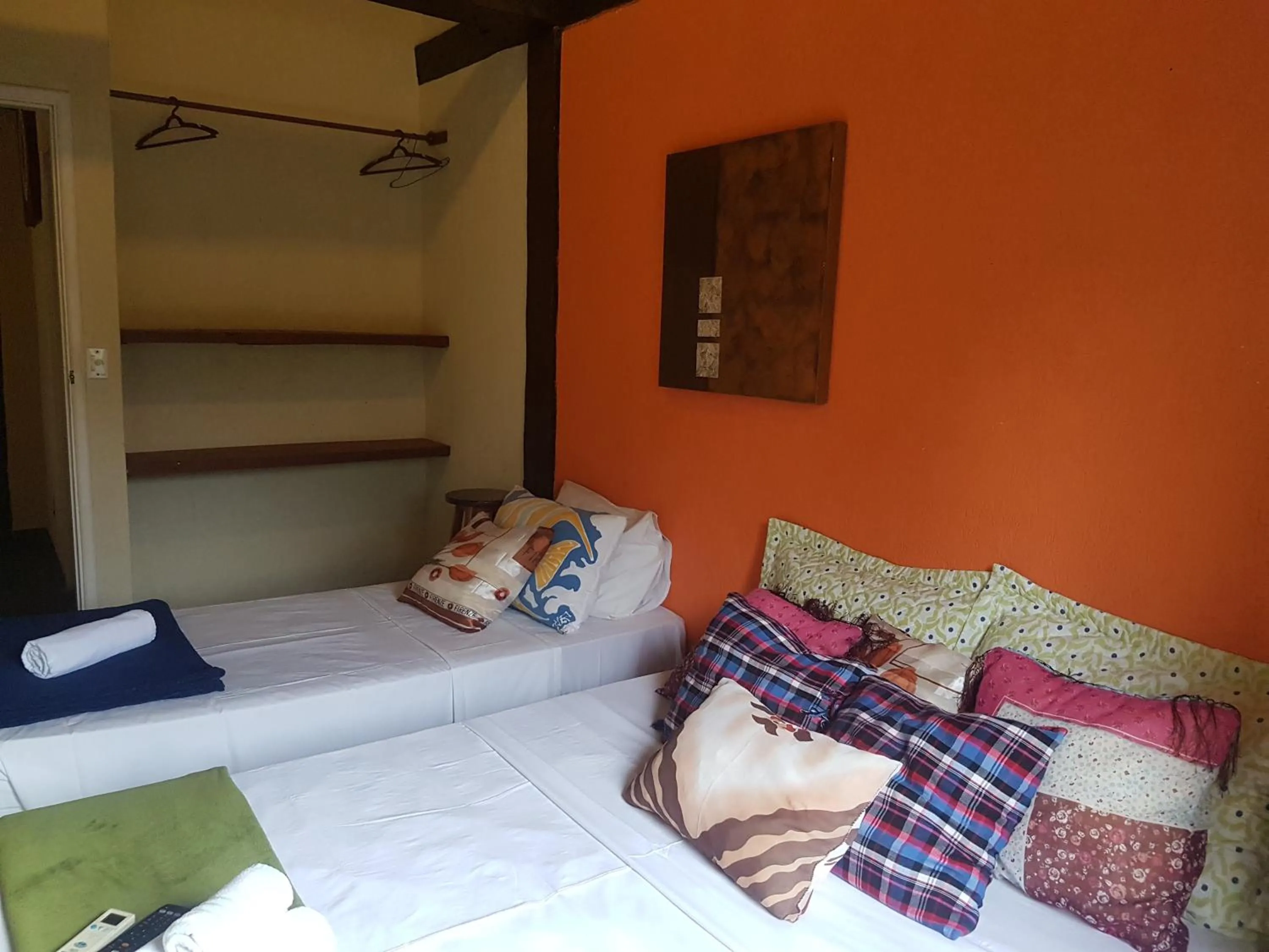 Bed in Pousada Delta Mar Maresias