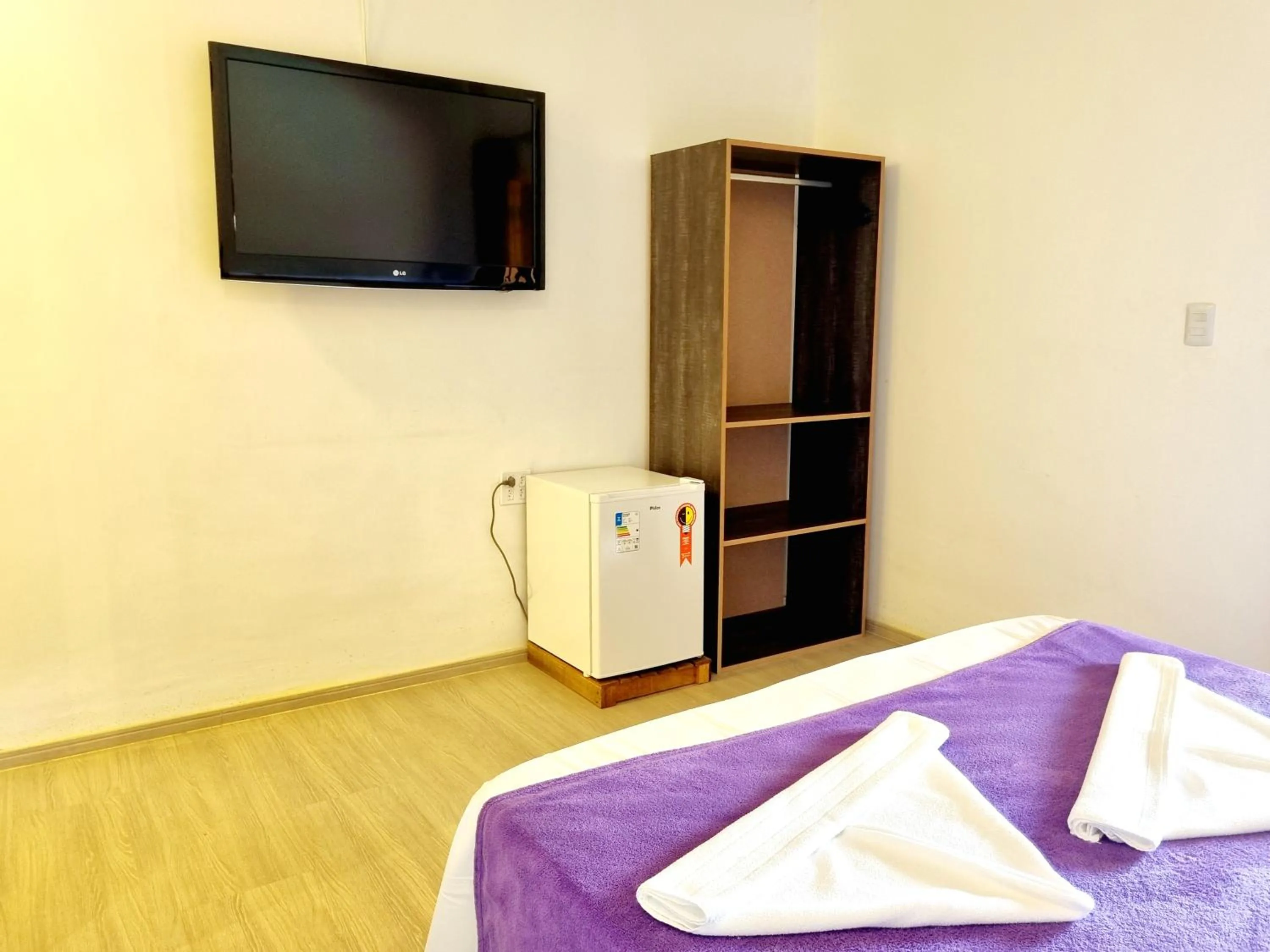 Bed in Pousada Delta Mar Maresias