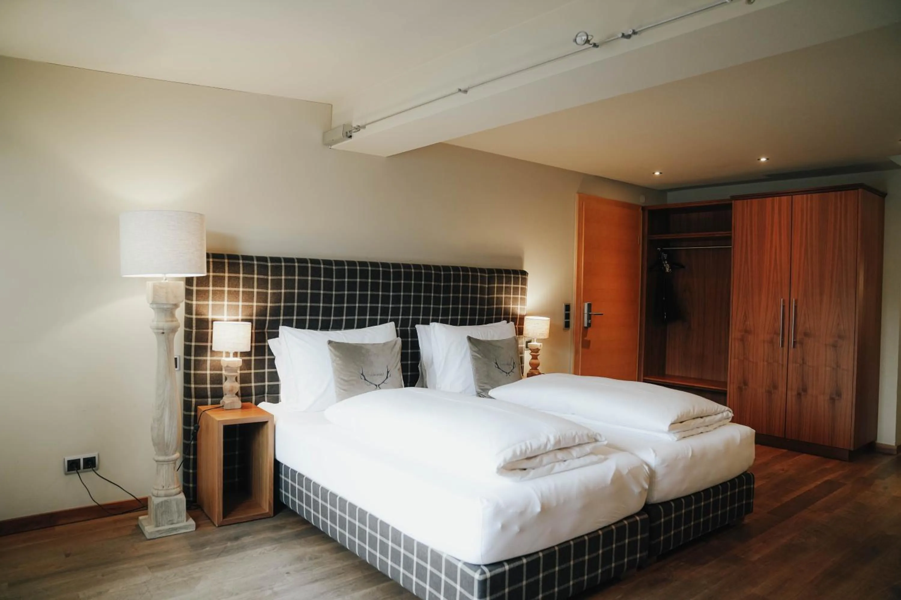 Bedroom, Bed in Boutiquehotel Weisses Rössl