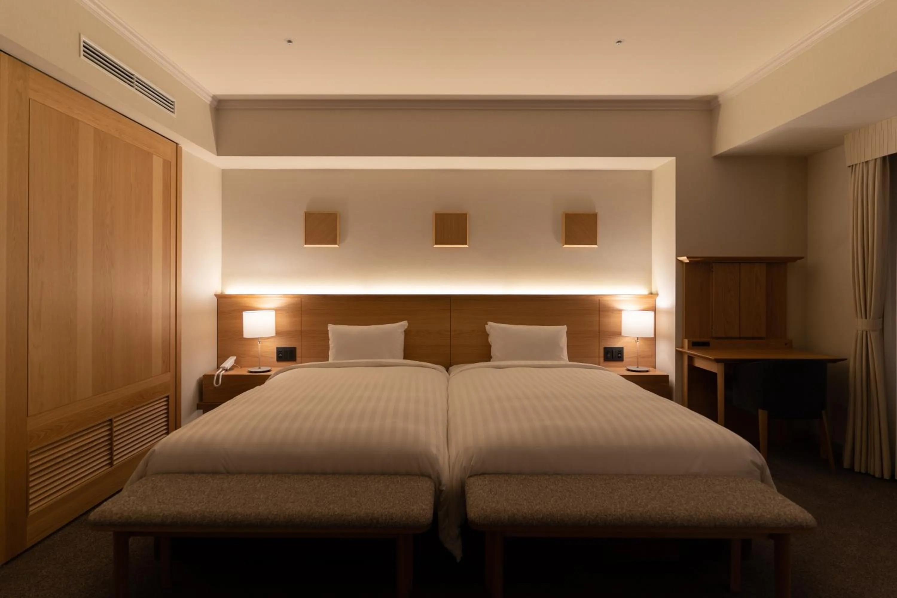 Bed in Authent Hotel Otaru