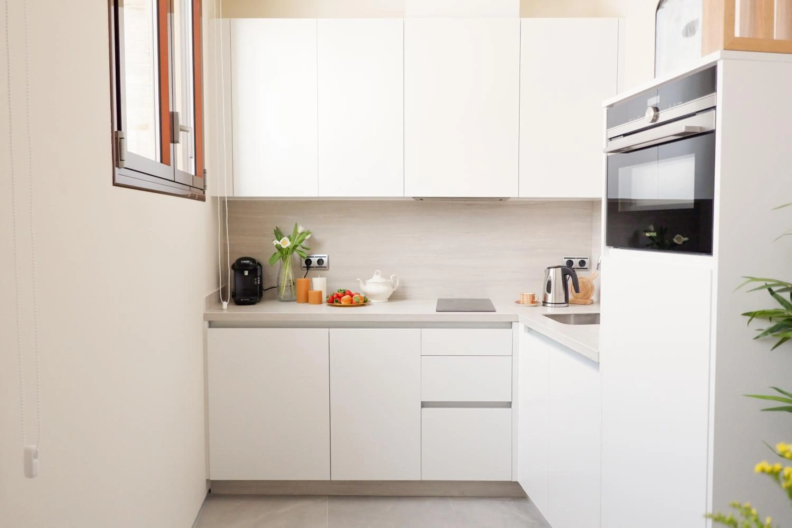 Kitchen or kitchenette in U-Sense Sevilla Catedral