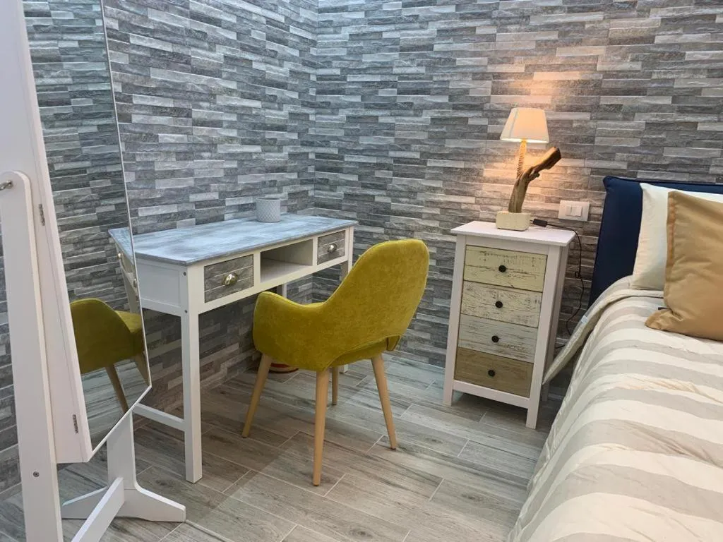 Bed in Le Dimore del Gufo B&B and Apartments Suite