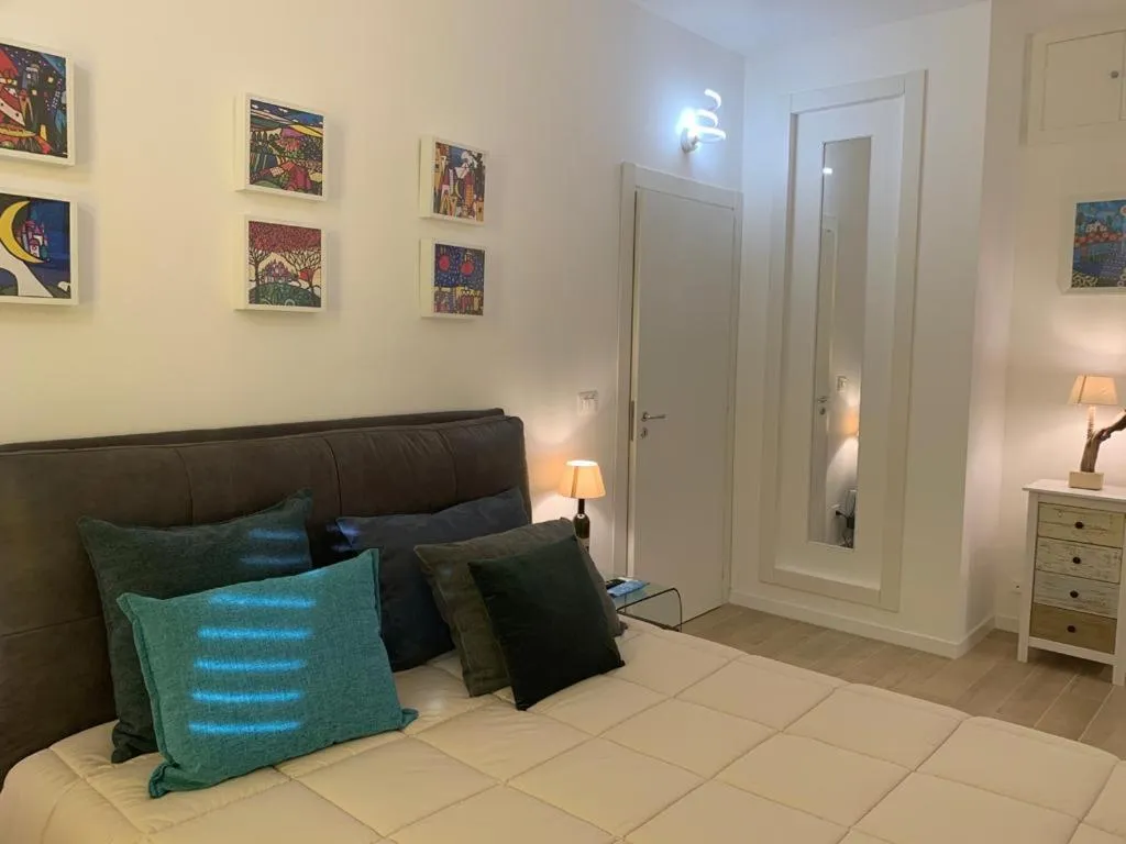 Bed in Le Dimore del Gufo B&B and Apartments Suite