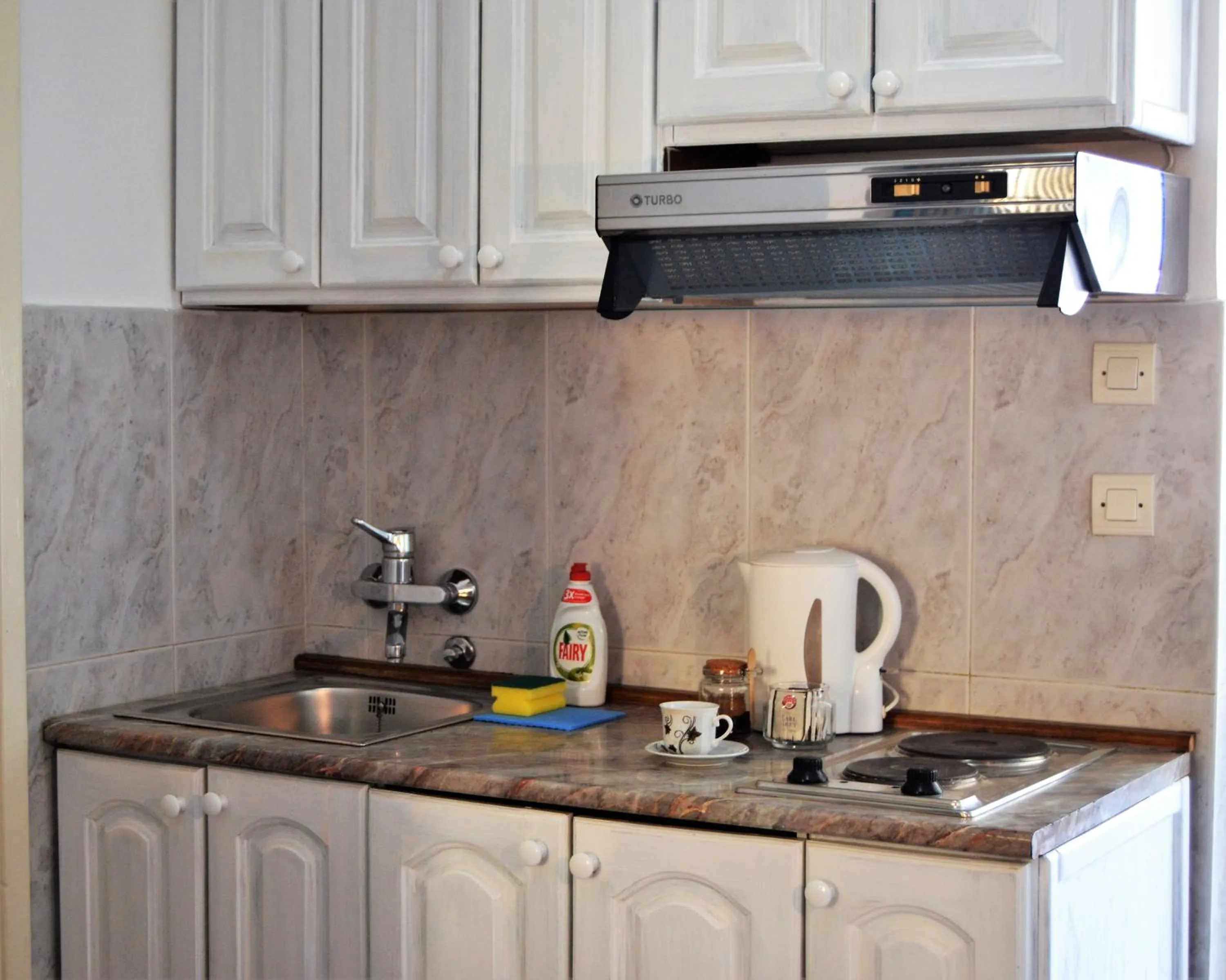 Kitchen or kitchenette in Yeshill Apart & Studio