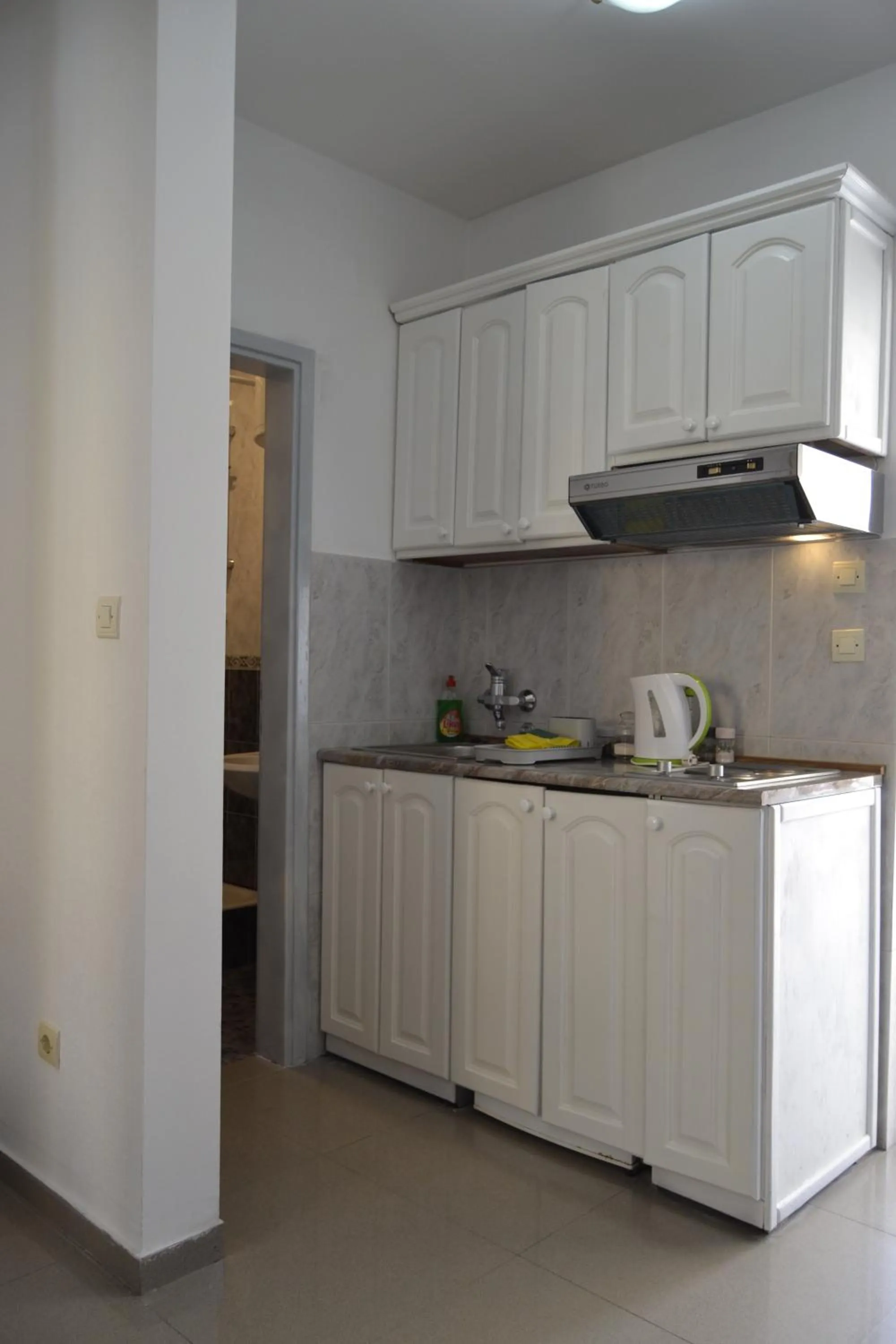 Kitchen or kitchenette in Yeshill Apart & Studio