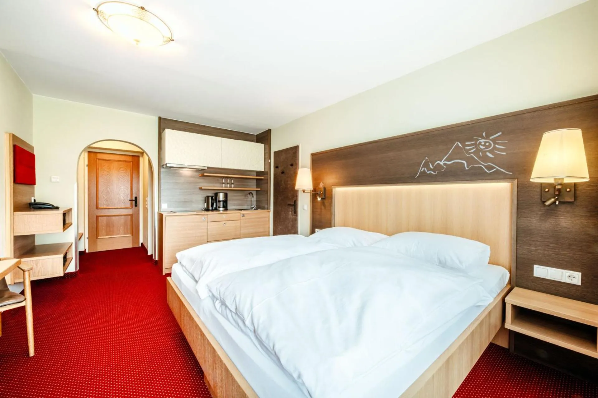 Kitchen or kitchenette, Bed in Harmls Aparthotel