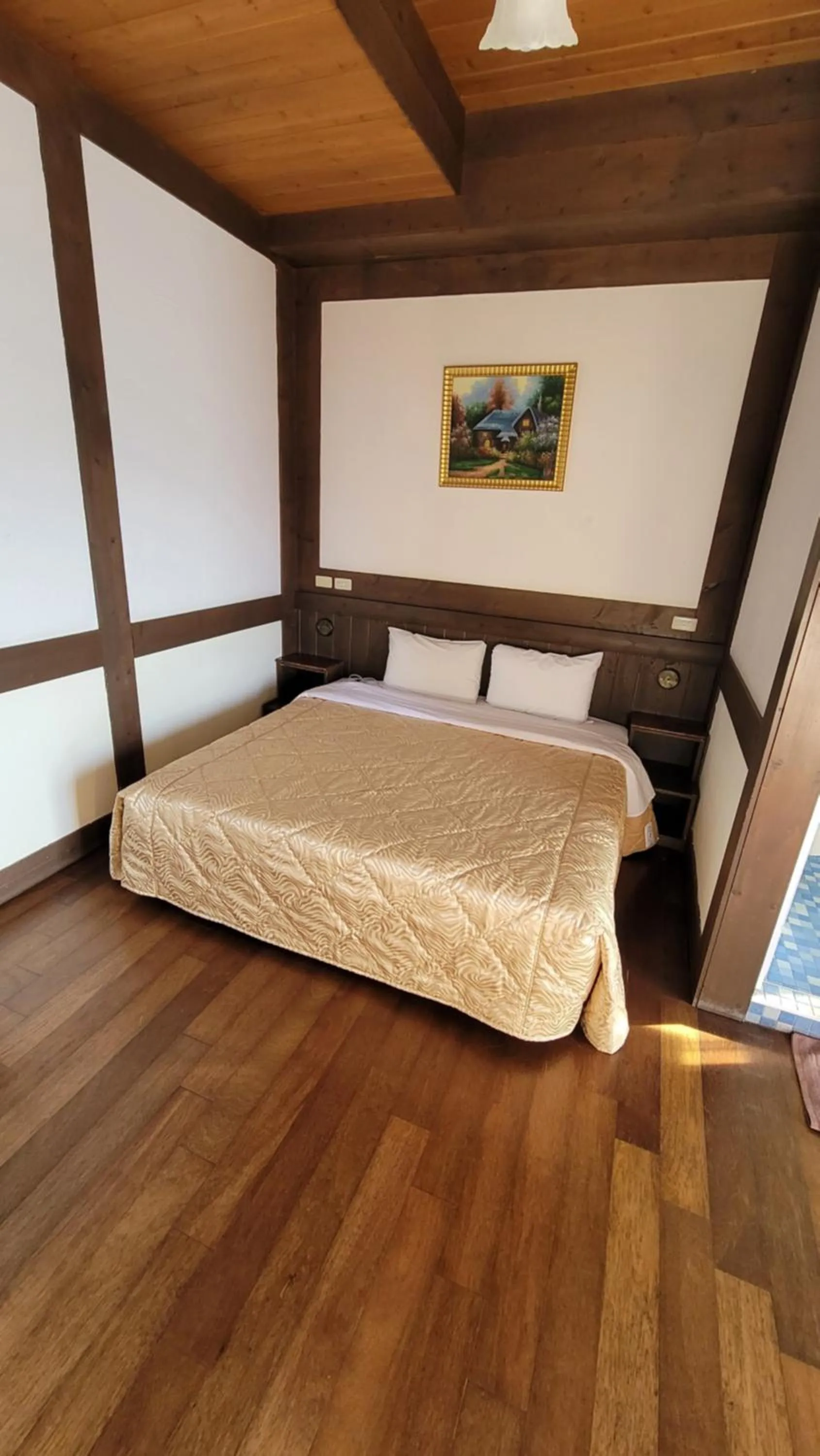 Bed in Maple Leave Holiday Villa