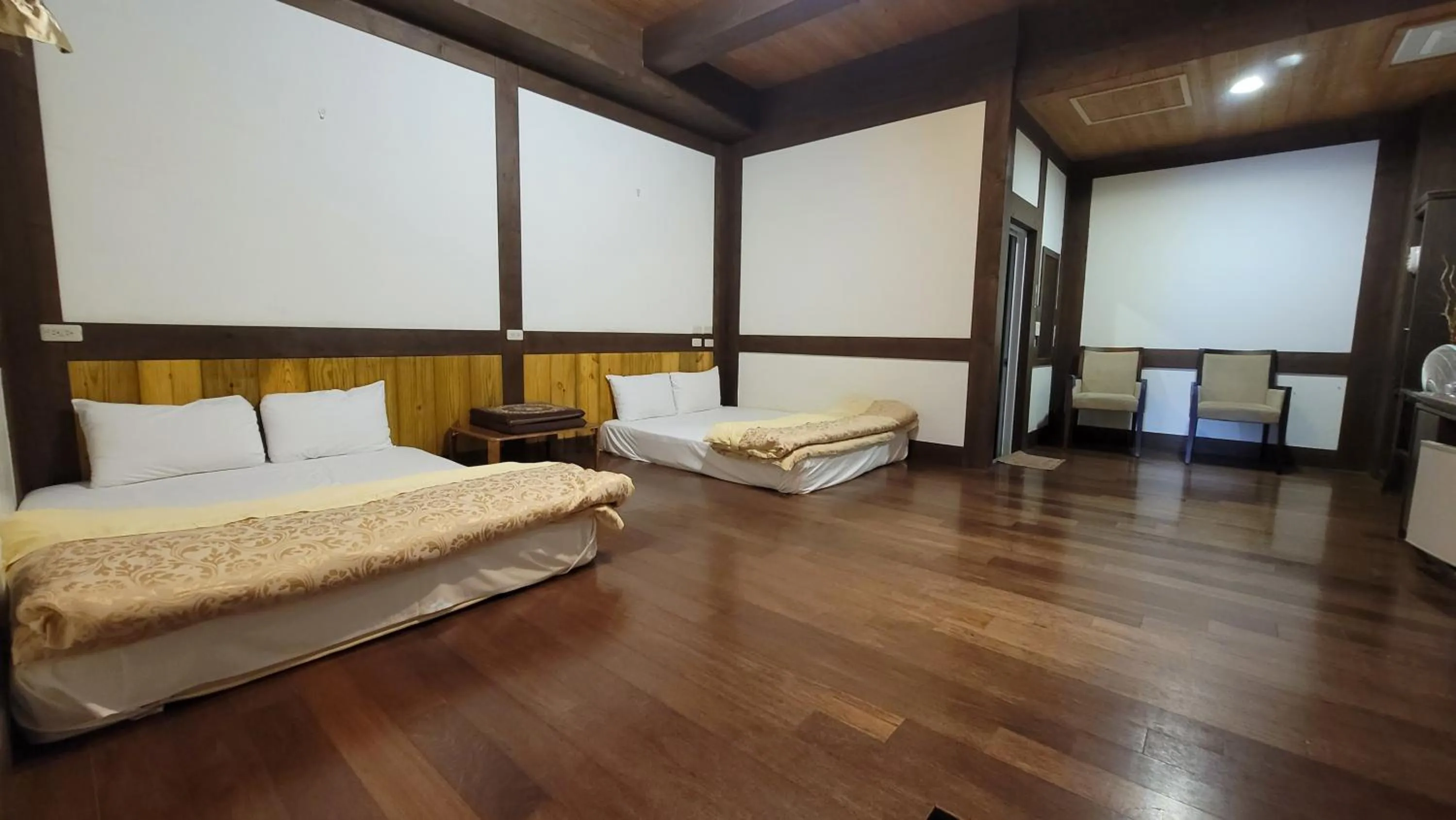 Bed in Maple Leave Holiday Villa