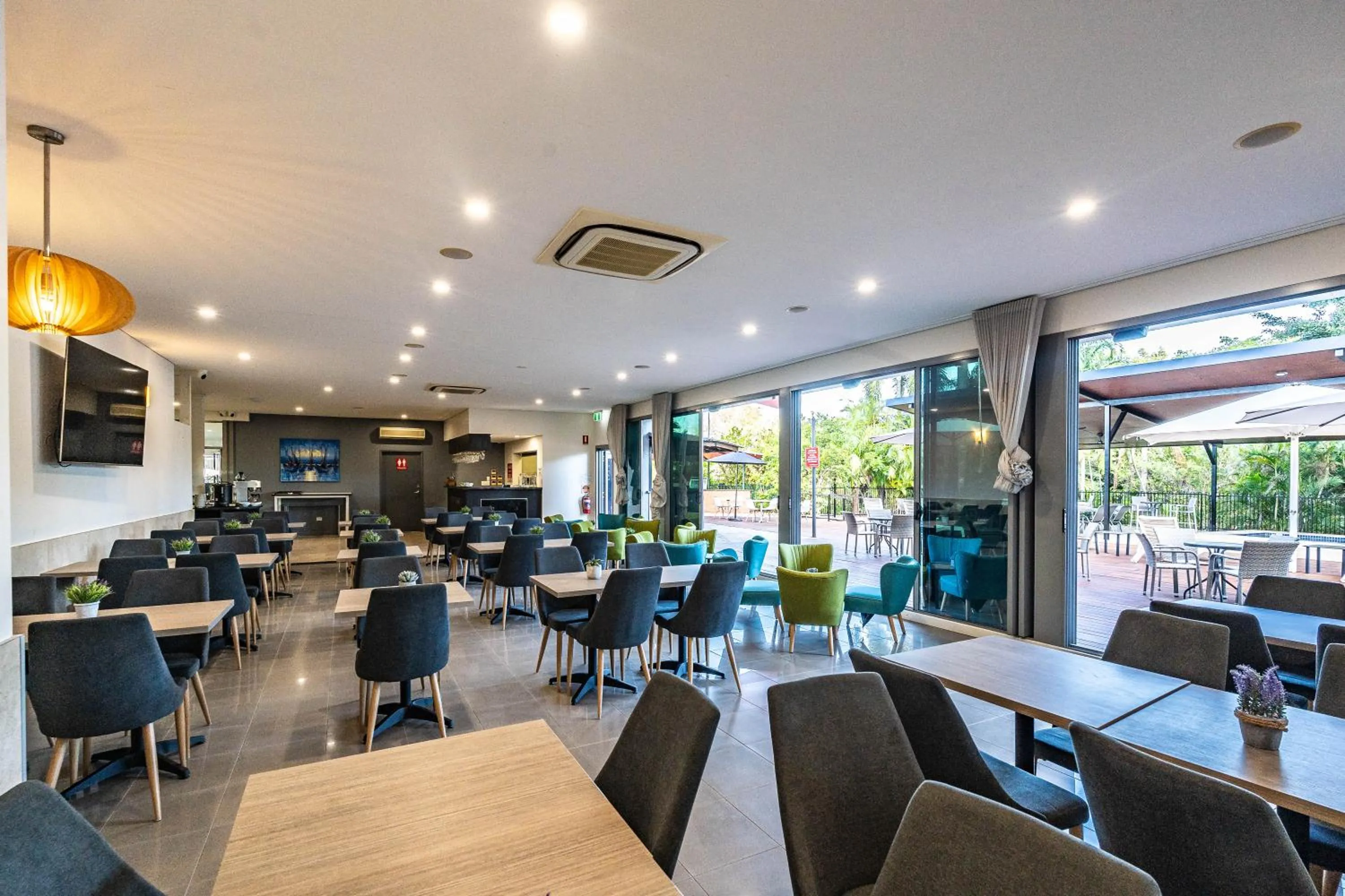 Dining area in Vitina Studios by Argus