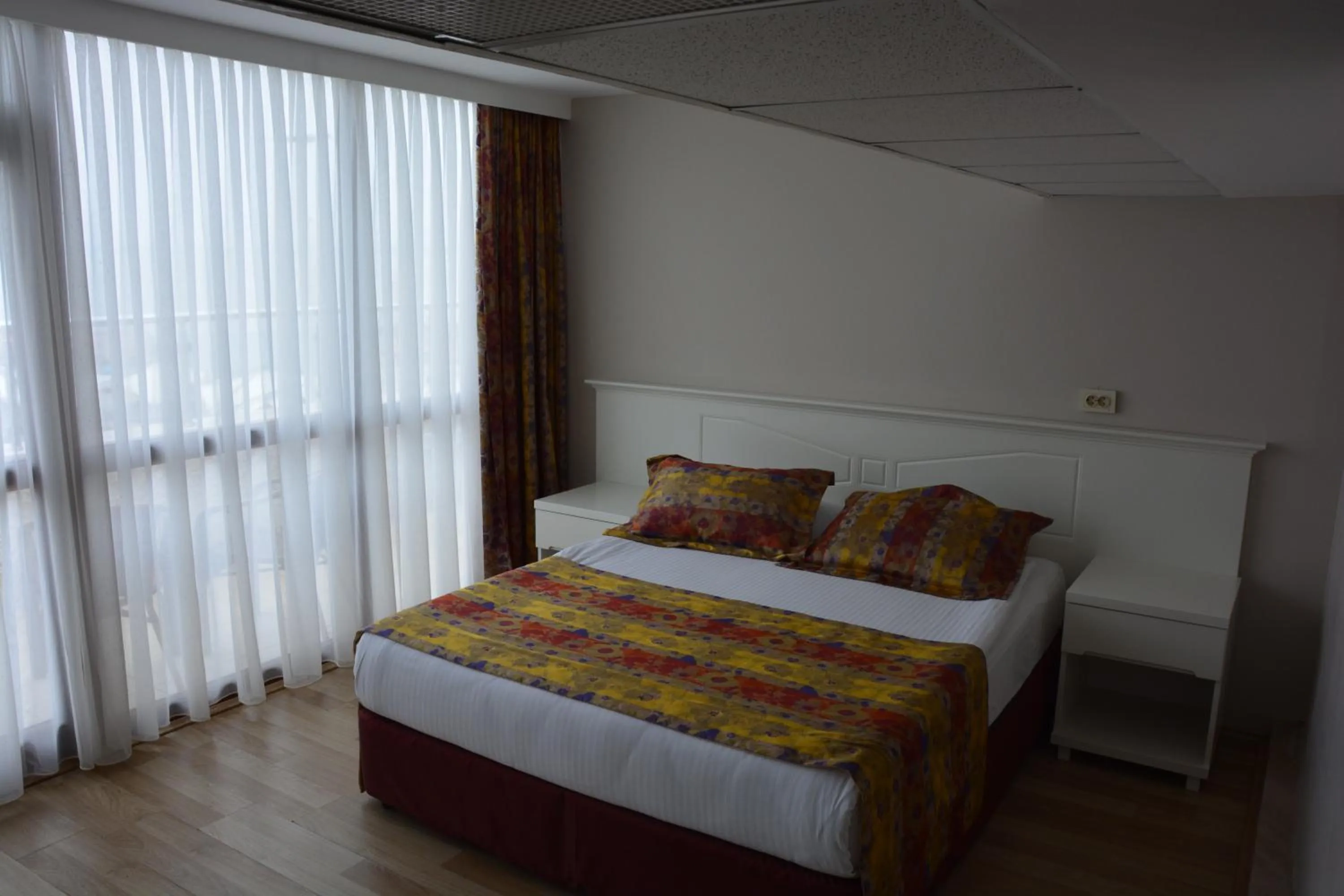 Bed in Grand Karot Hotel