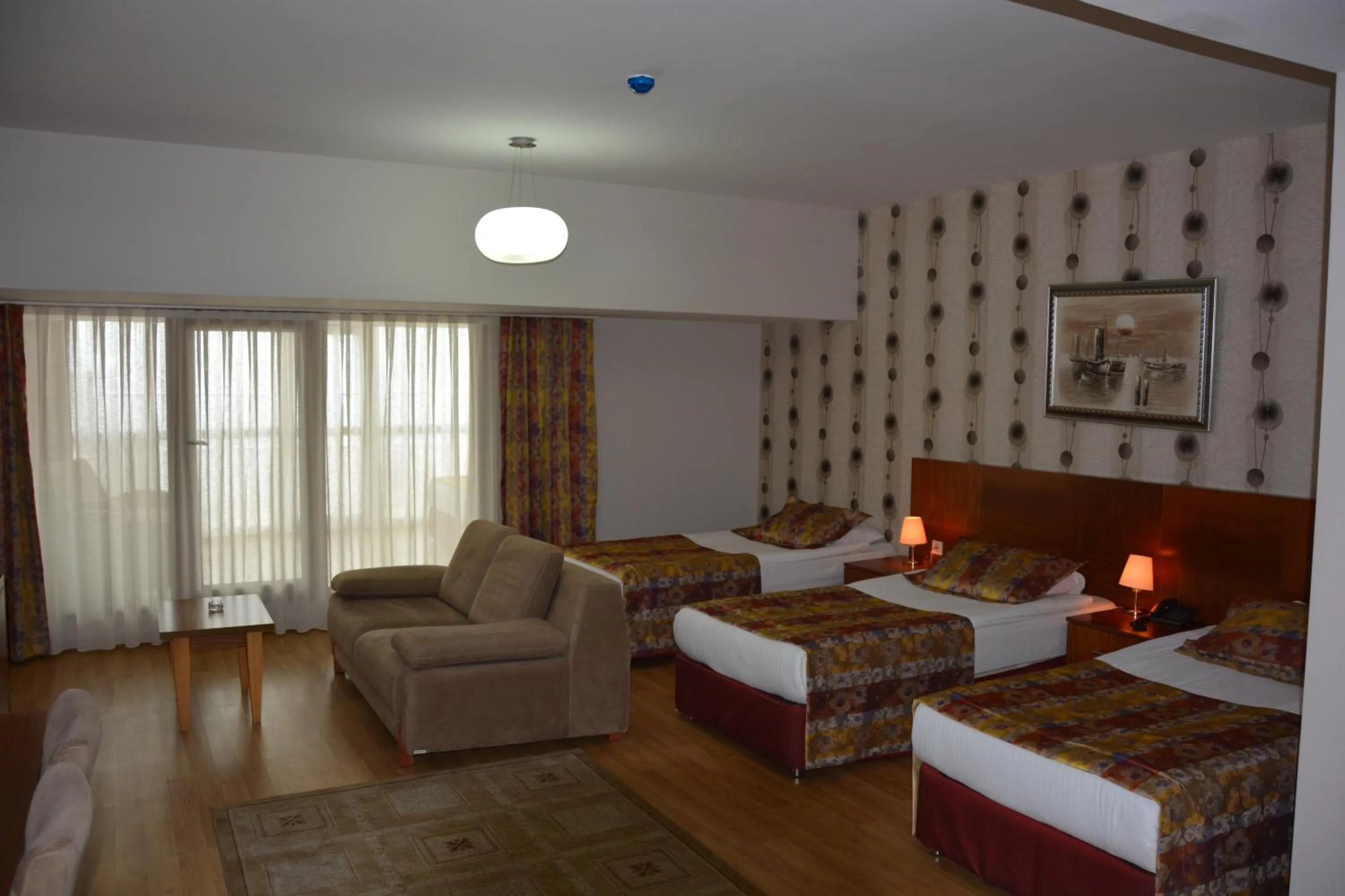 Bed in Grand Karot Hotel