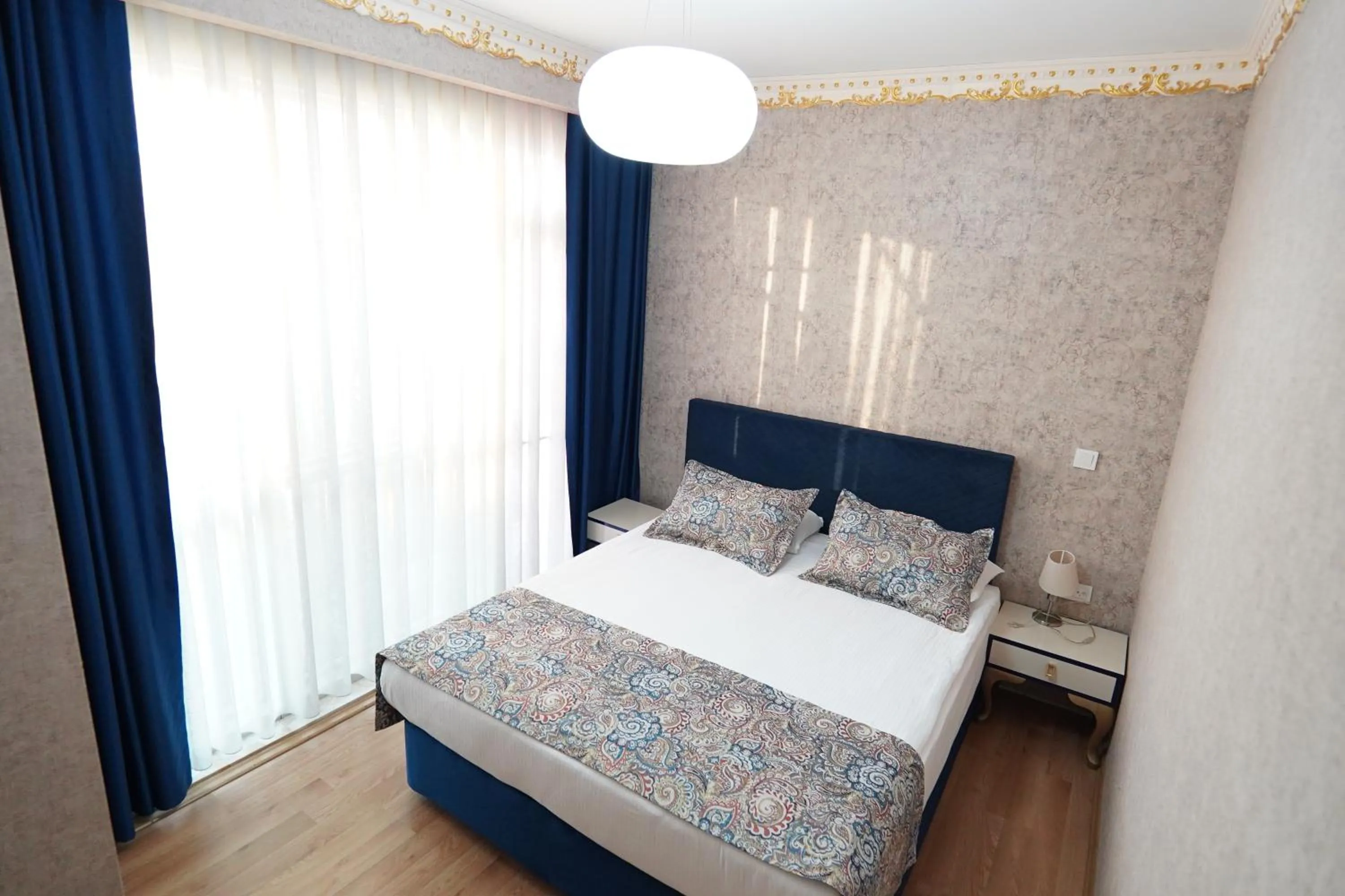 Bed in Grand Karot Hotel