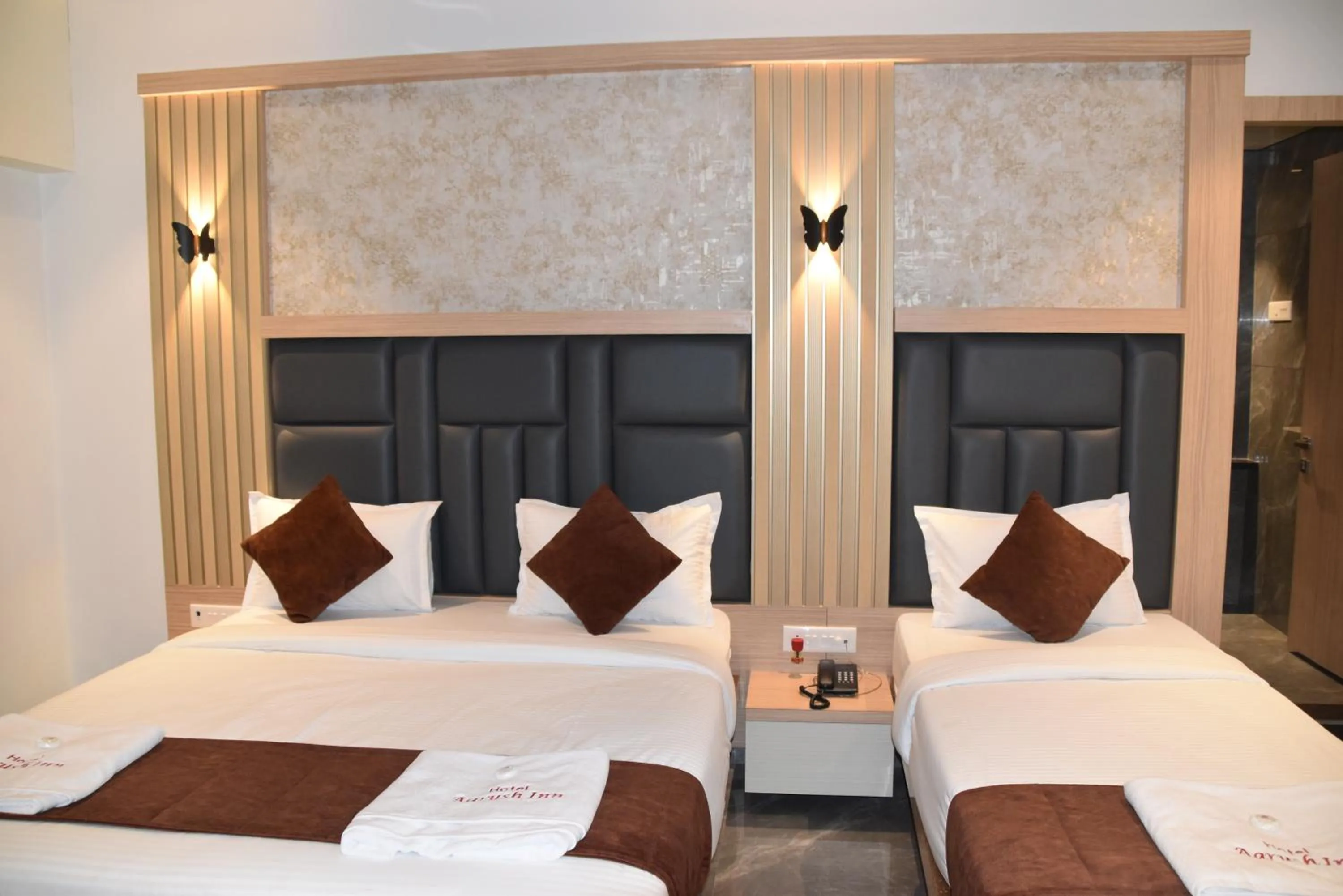 Bed in Hotel Aarush Inn