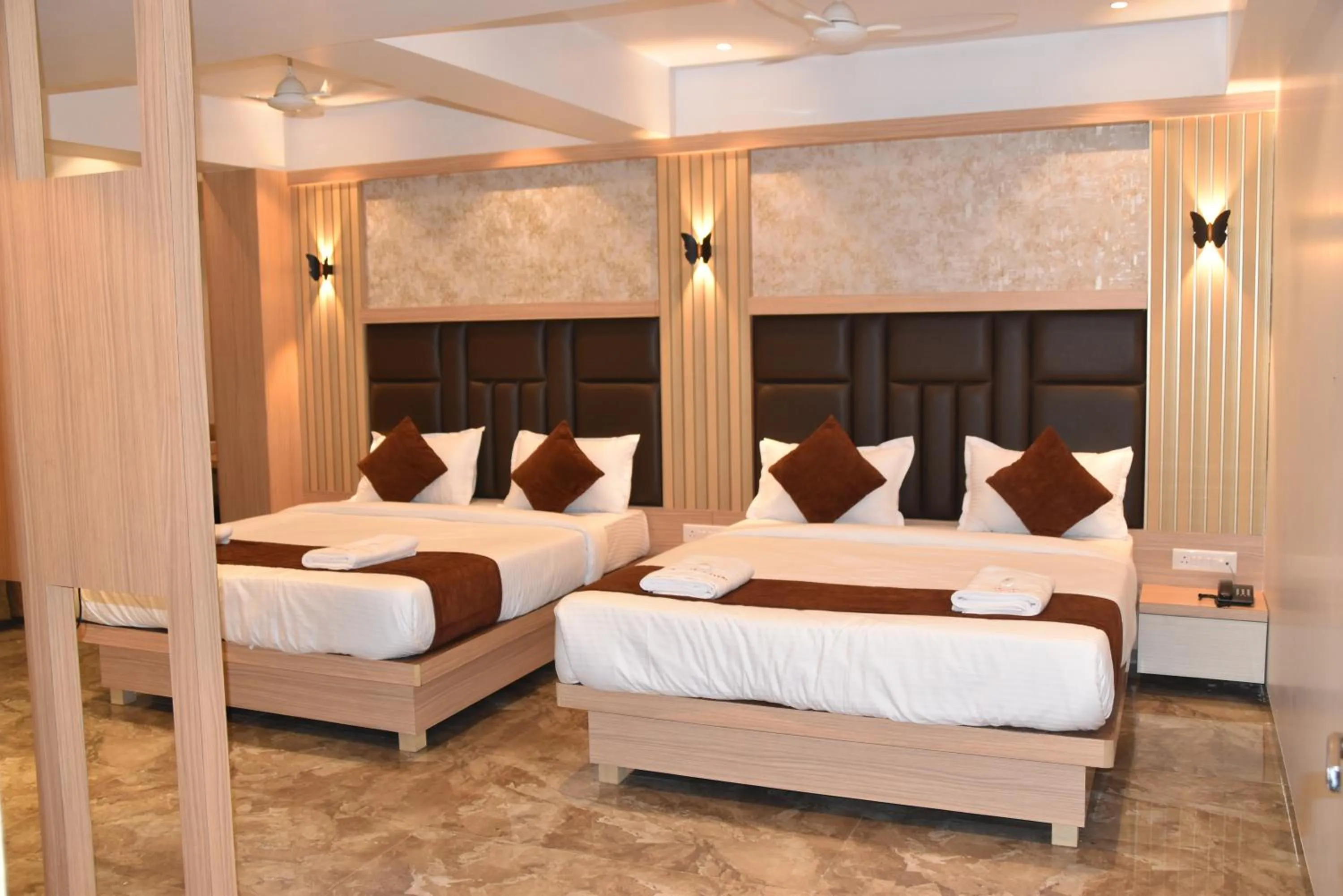 Bed in Hotel Aarush Inn