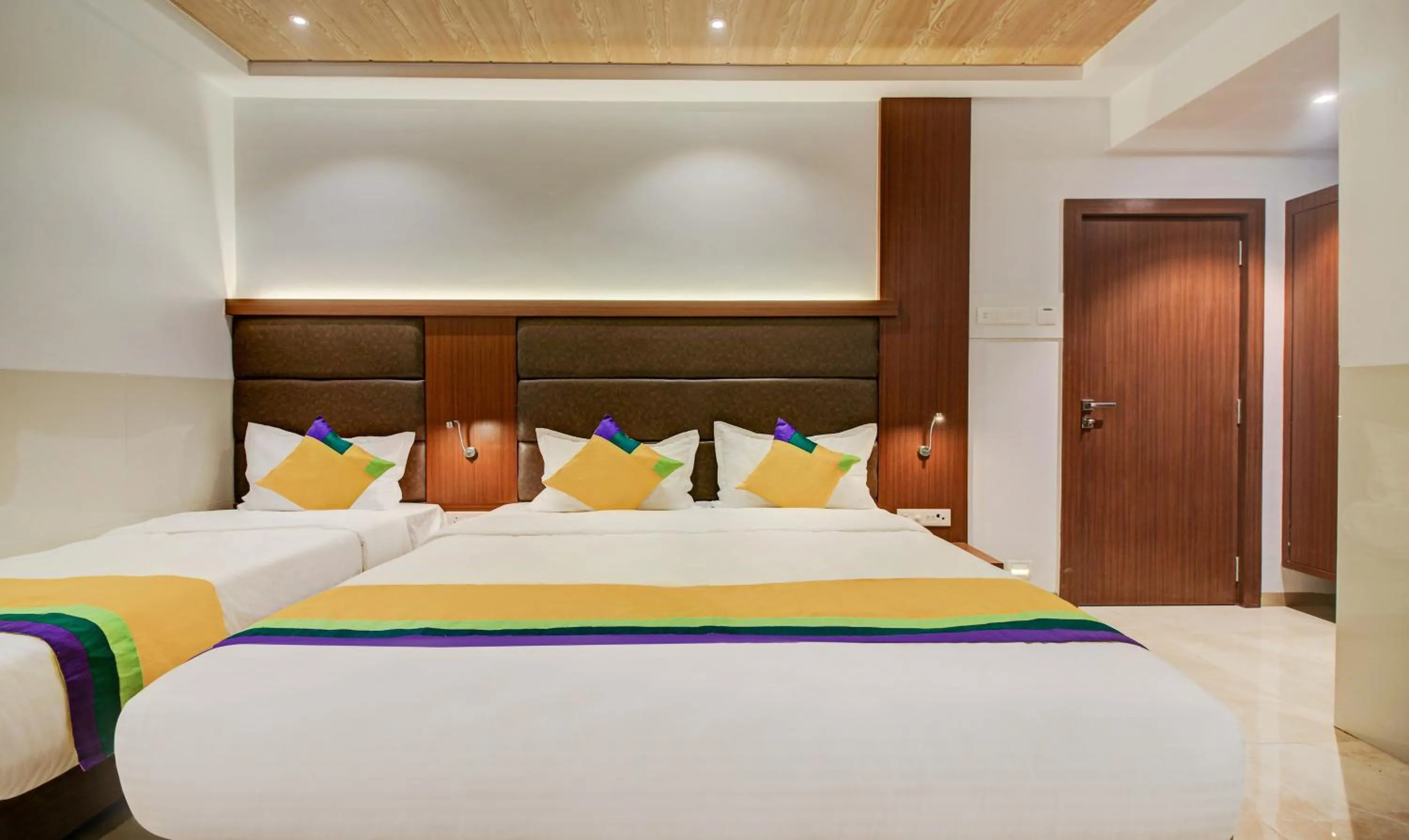 Bed in Hotel Aarush Inn