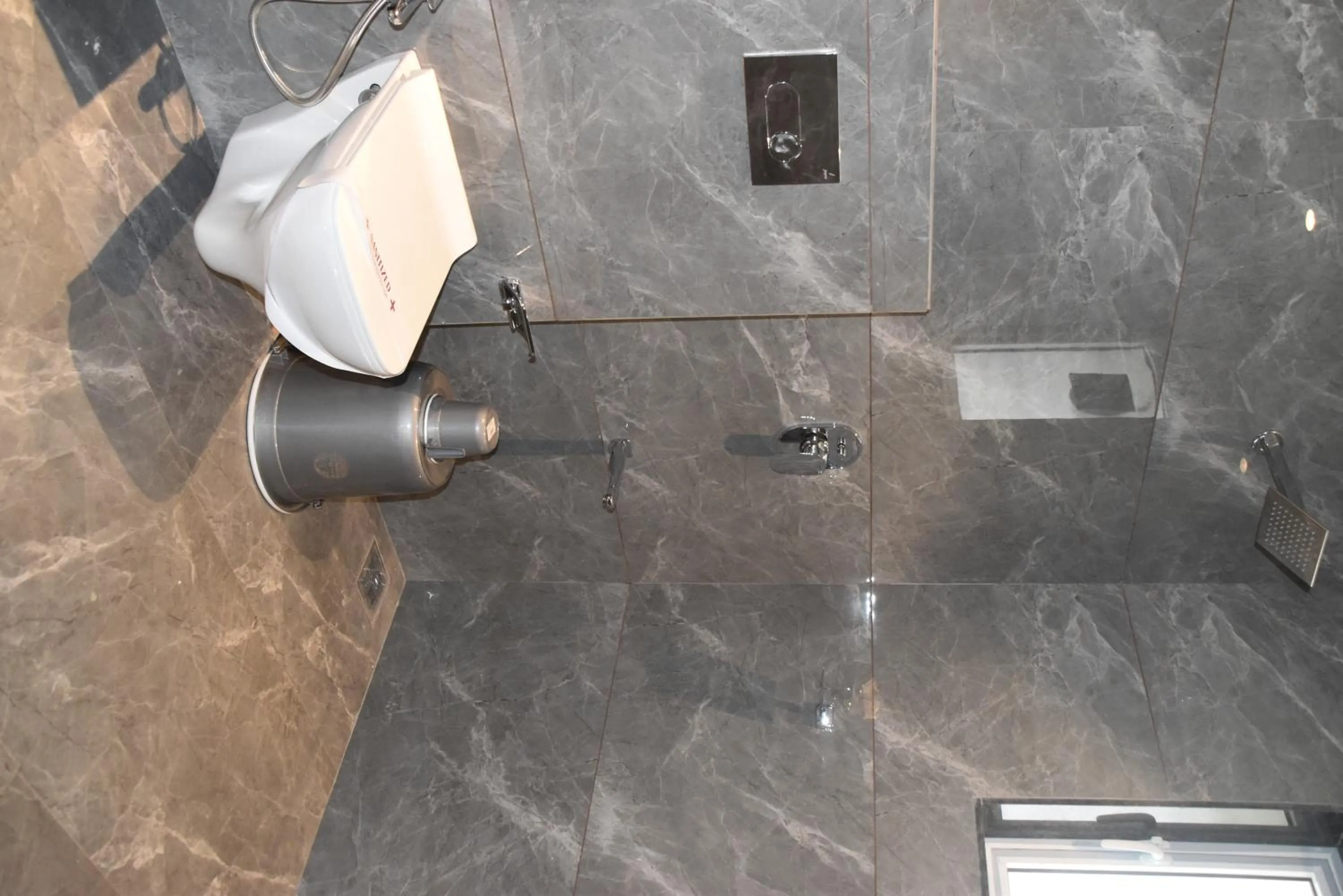 Shower in Hotel Aarush Inn