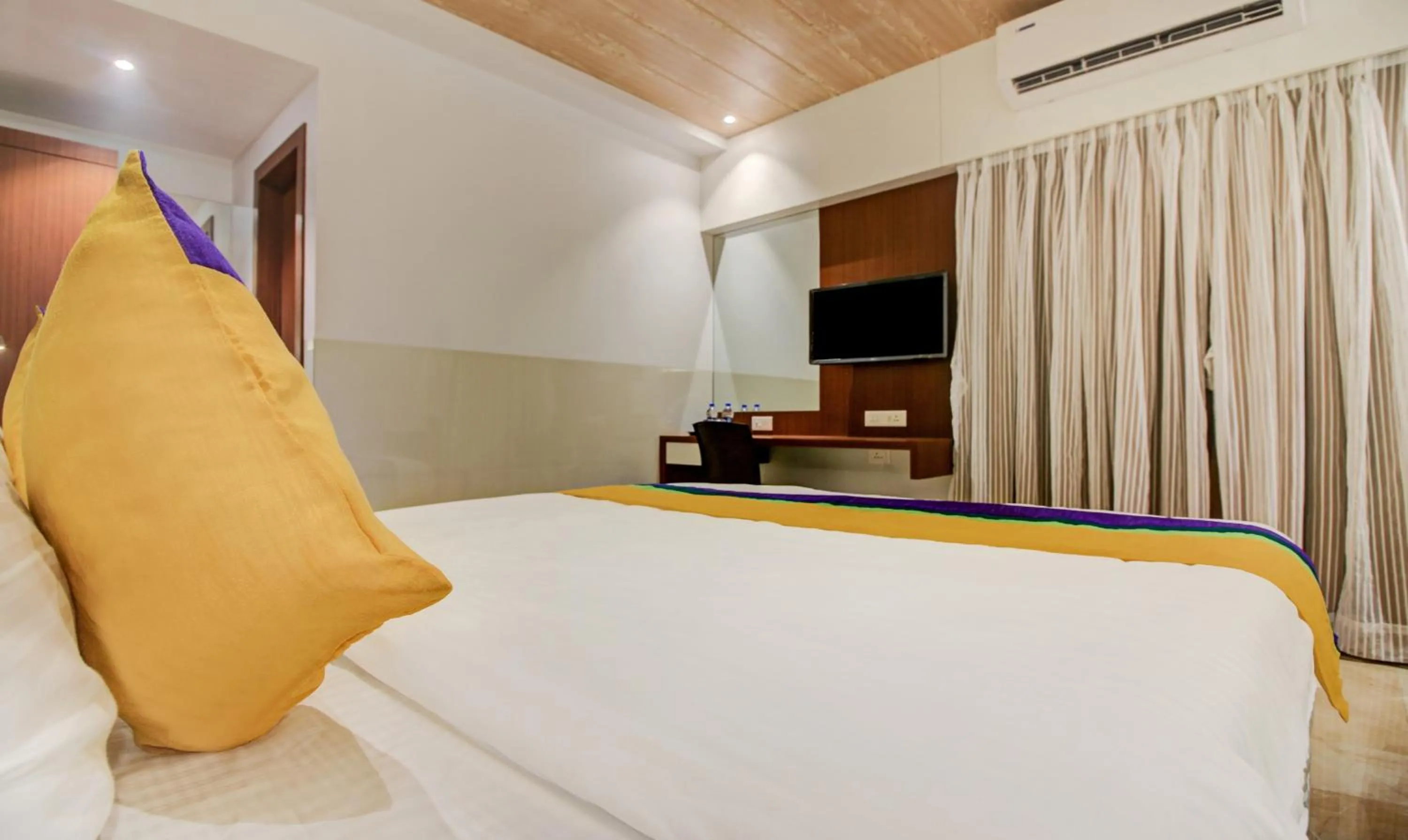 Bed in Hotel Aarush Inn