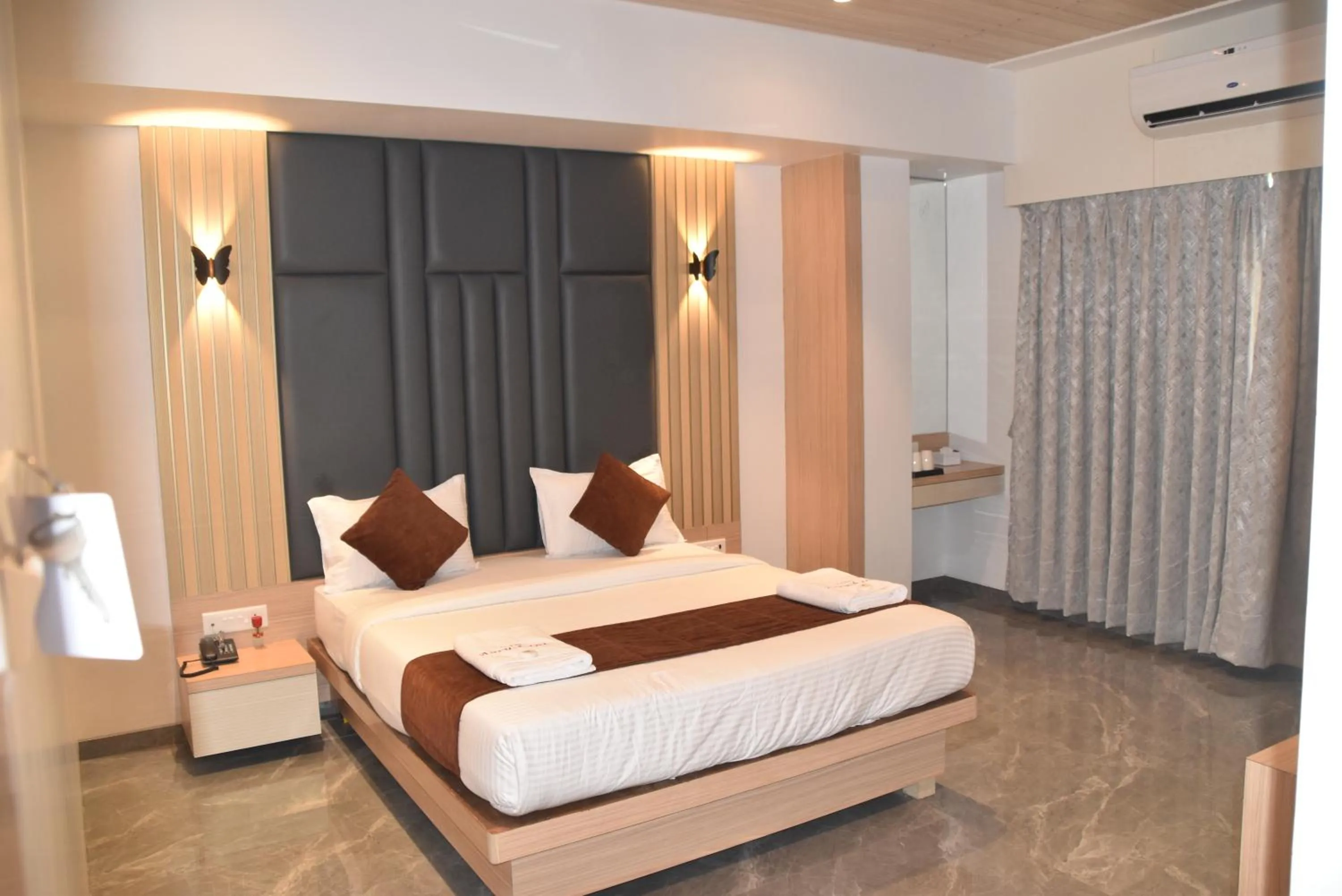 Bed in Hotel Aarush Inn