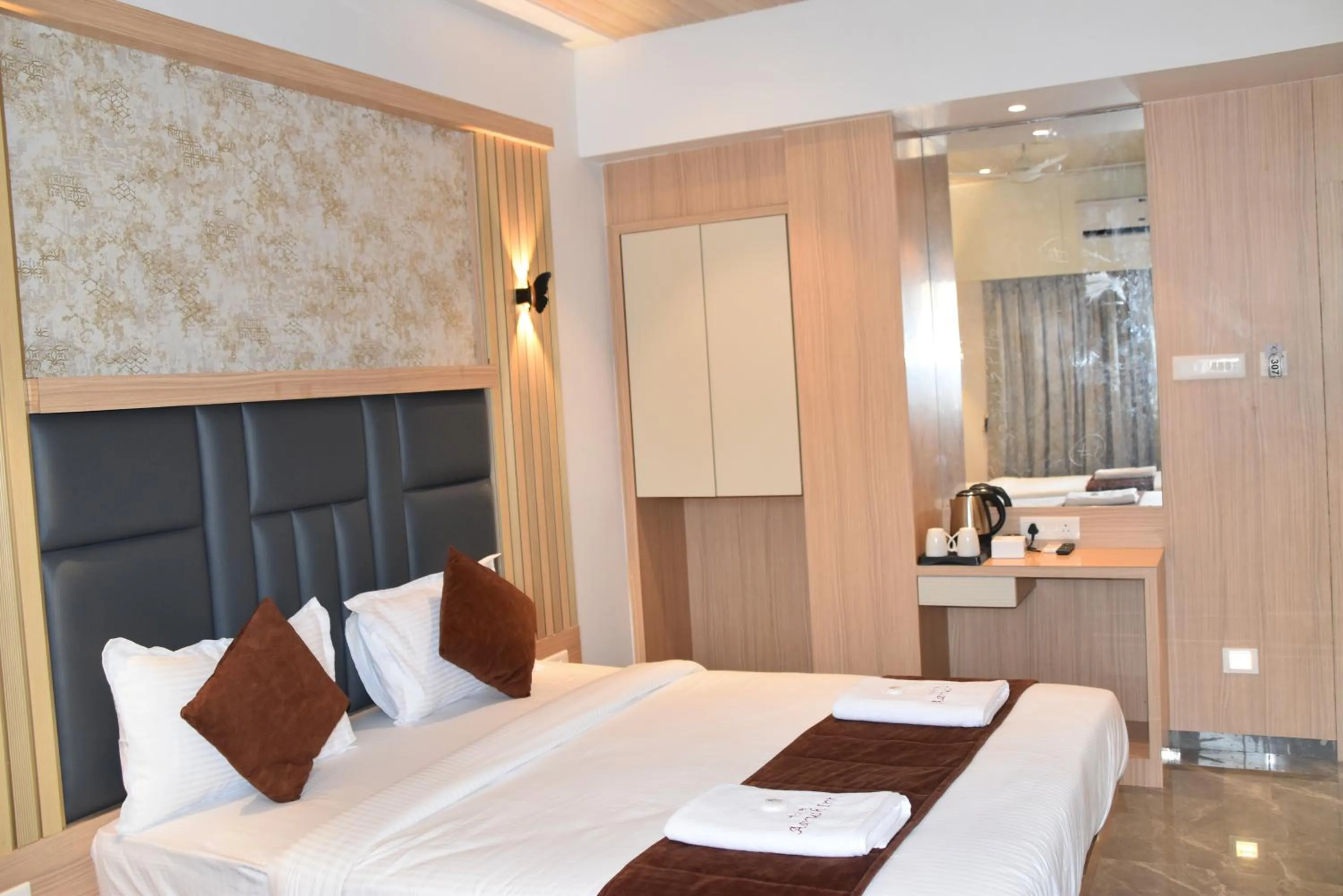 Bed in Hotel Aarush Inn