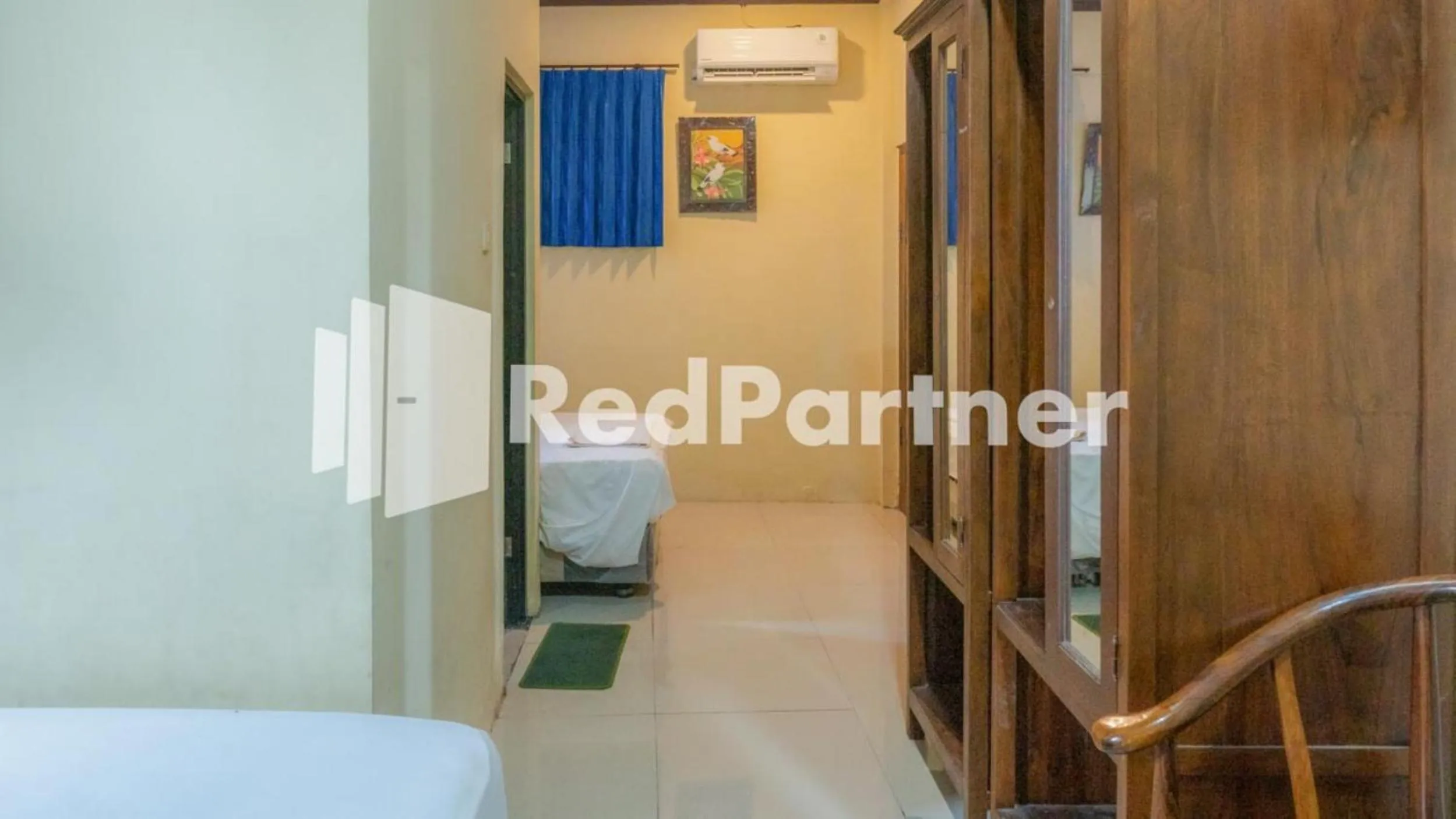 Bed in Vandhela Homestay Syariah Mitra RedDoorz
