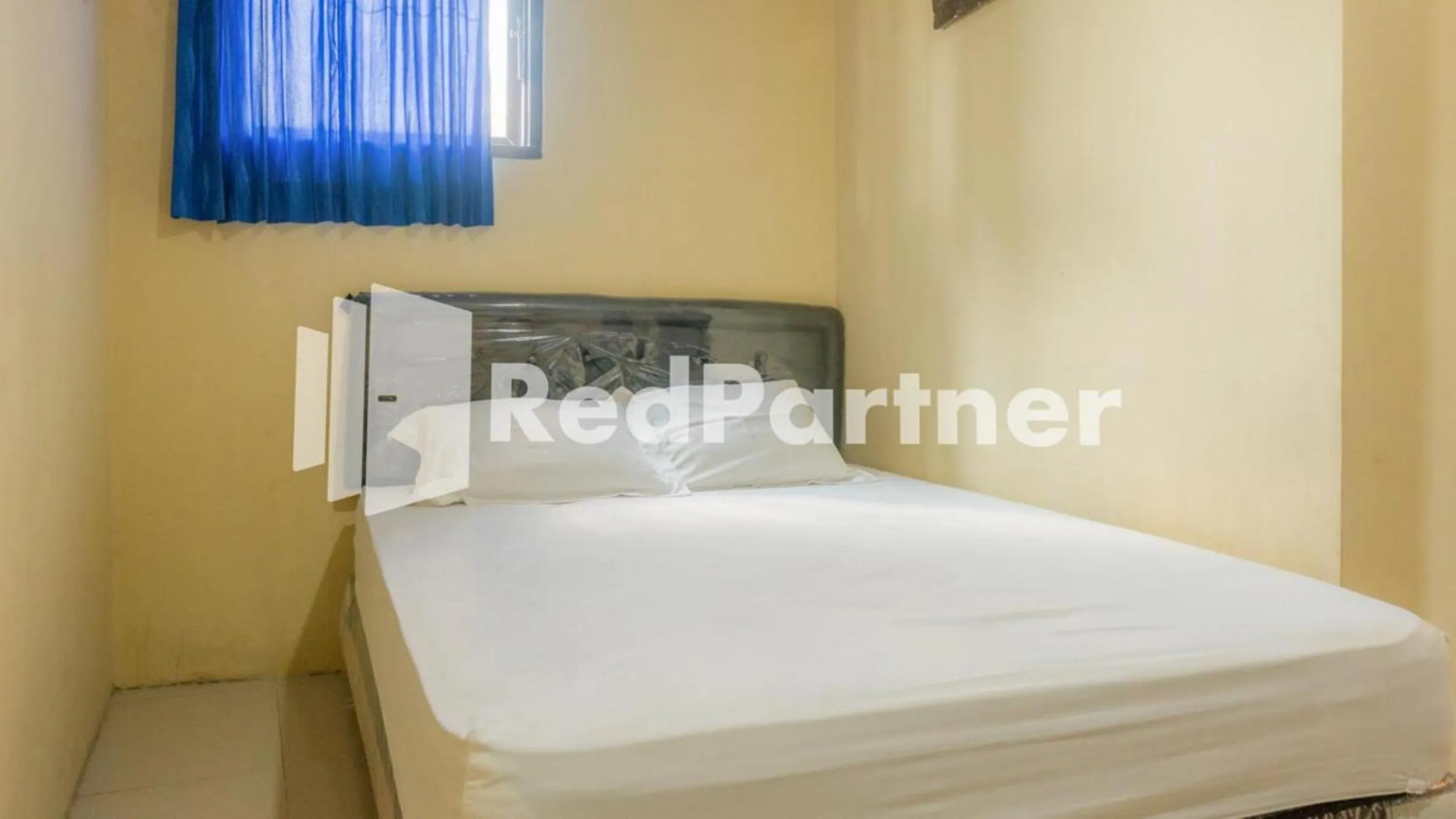 Bed in Vandhela Homestay Syariah Mitra RedDoorz