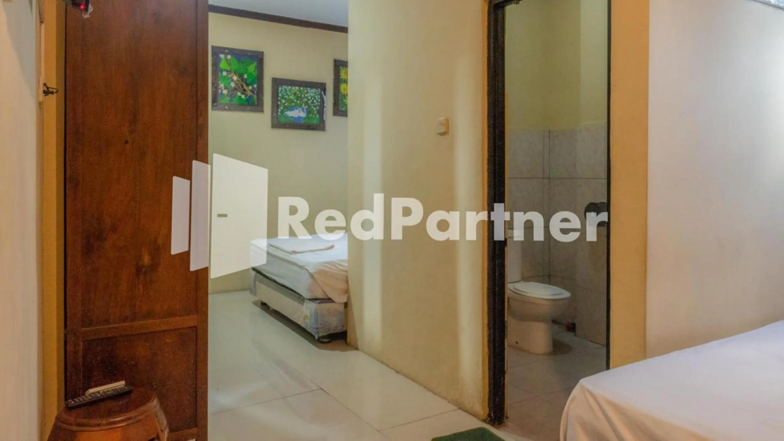 Bed in Vandhela Homestay Syariah Mitra RedDoorz